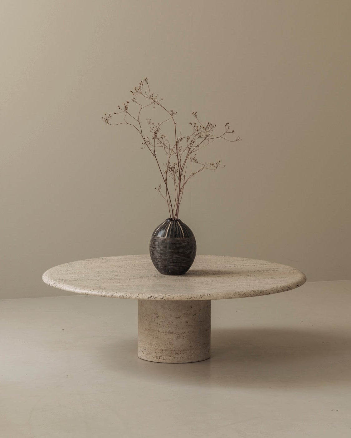 Travertine round coffee table by Angelo Mangiarotti, Italy 1970s by Modern Living | The Oblist