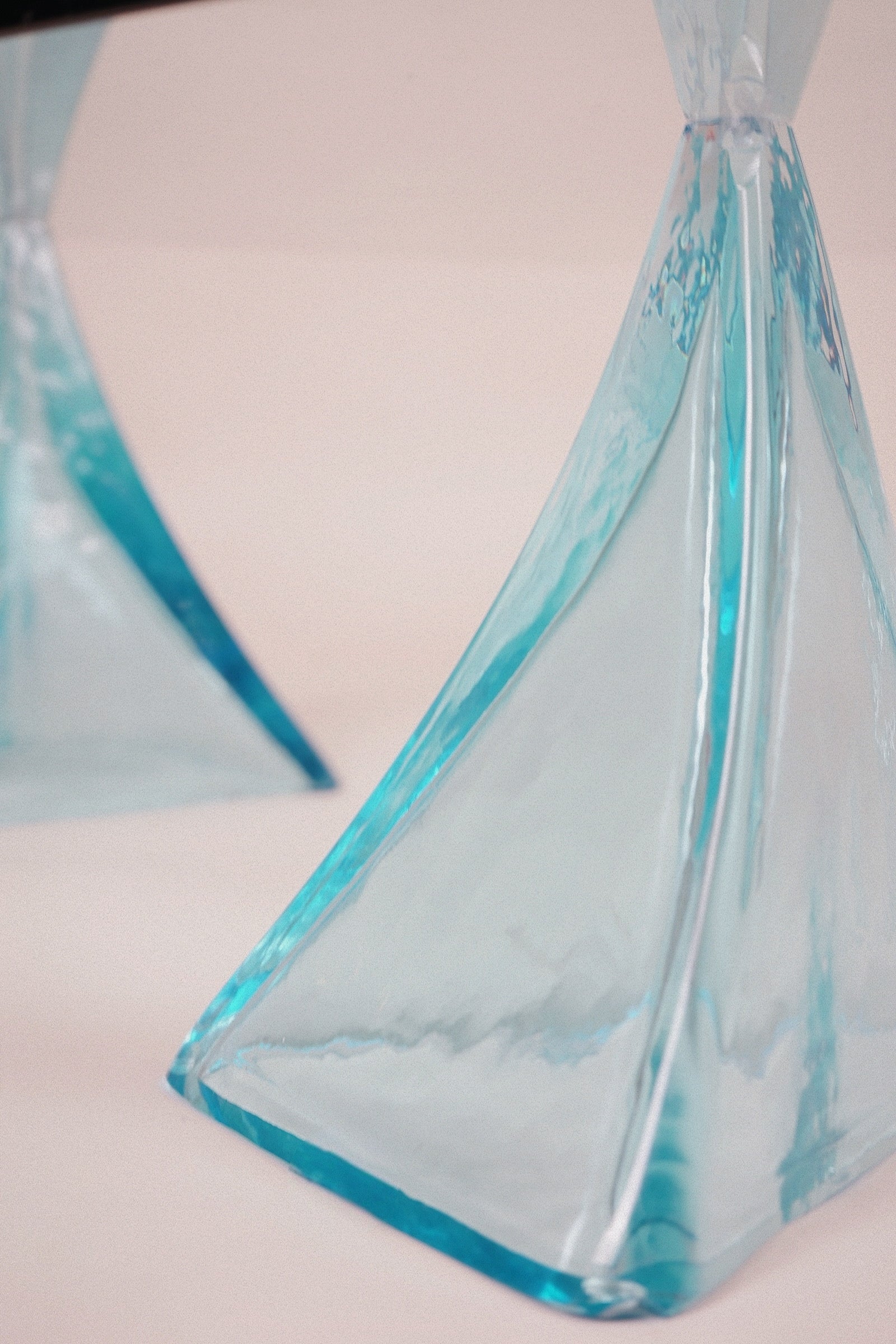 Glass Coffee Table with Sculptural Blue Glass Supports, c.1980s–1990s — close-up of blue glass supports