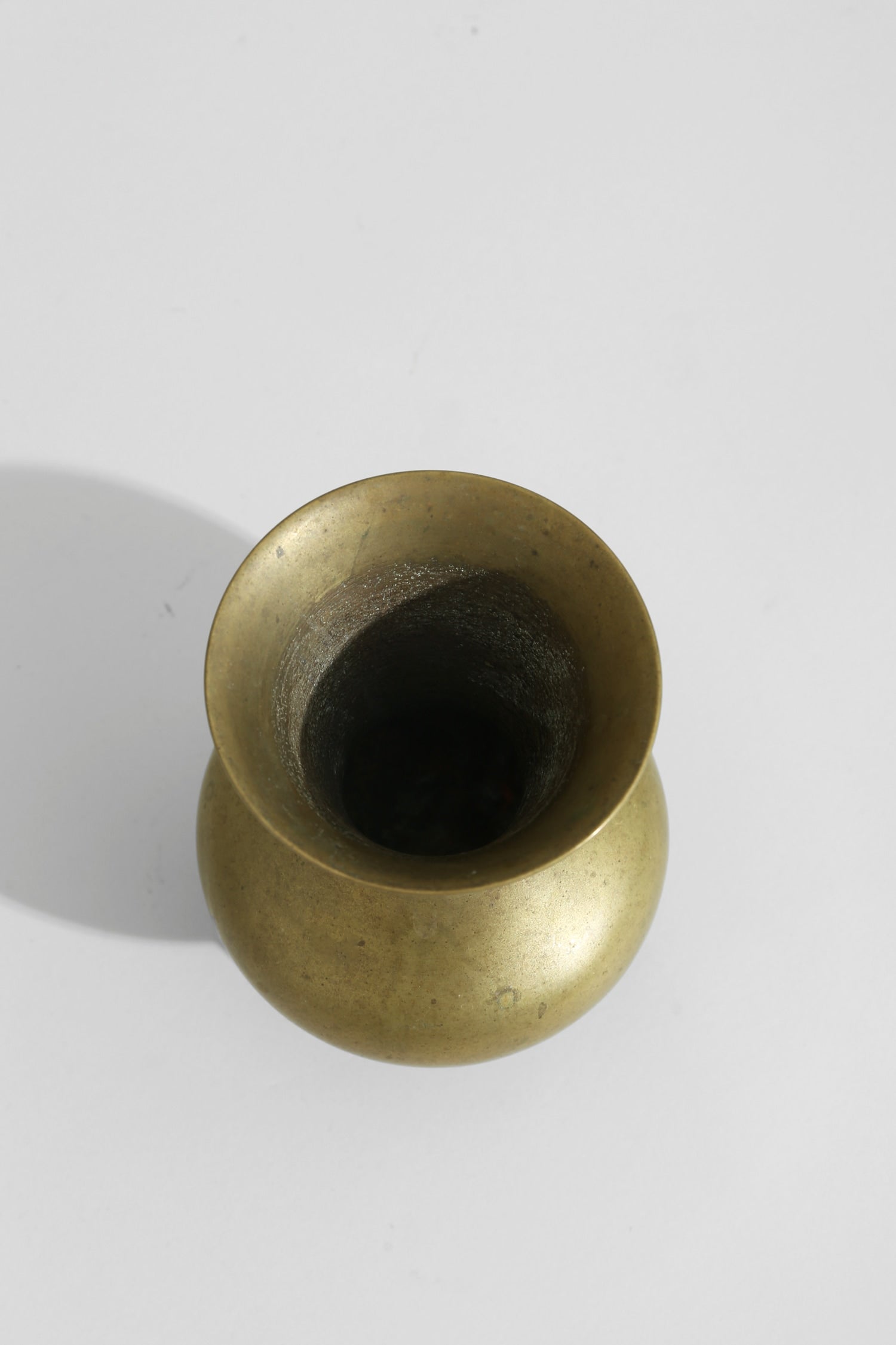 Modernist Brass Vessel — lifestyle setting
