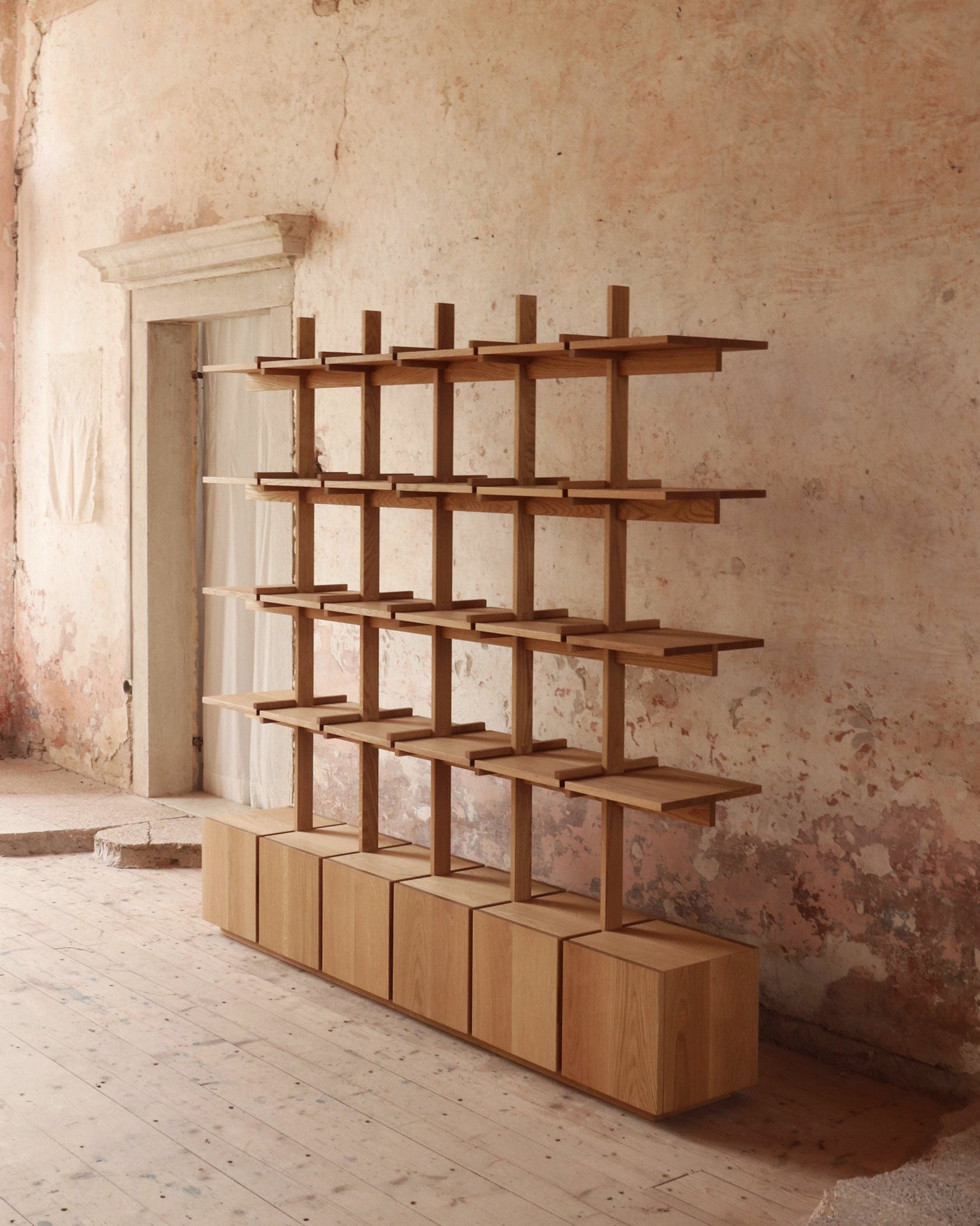 Veliero modular wooden bookshelf with geometric grid design