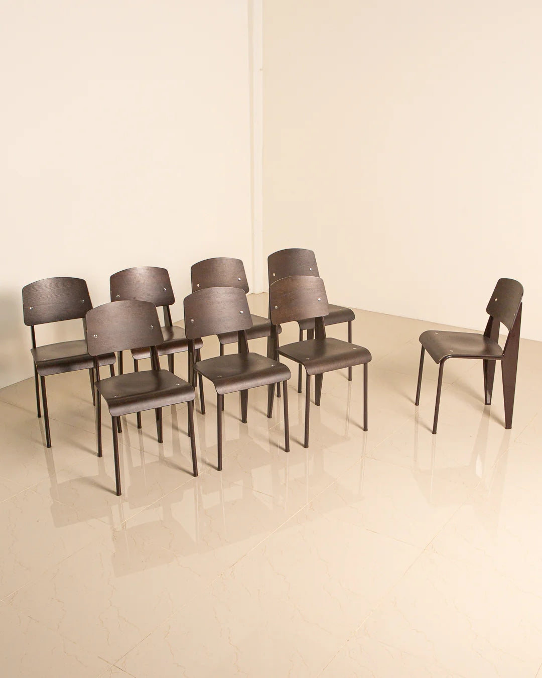 Set of 8 Jean Prouvé Standard chairs in dark wood for Vitra