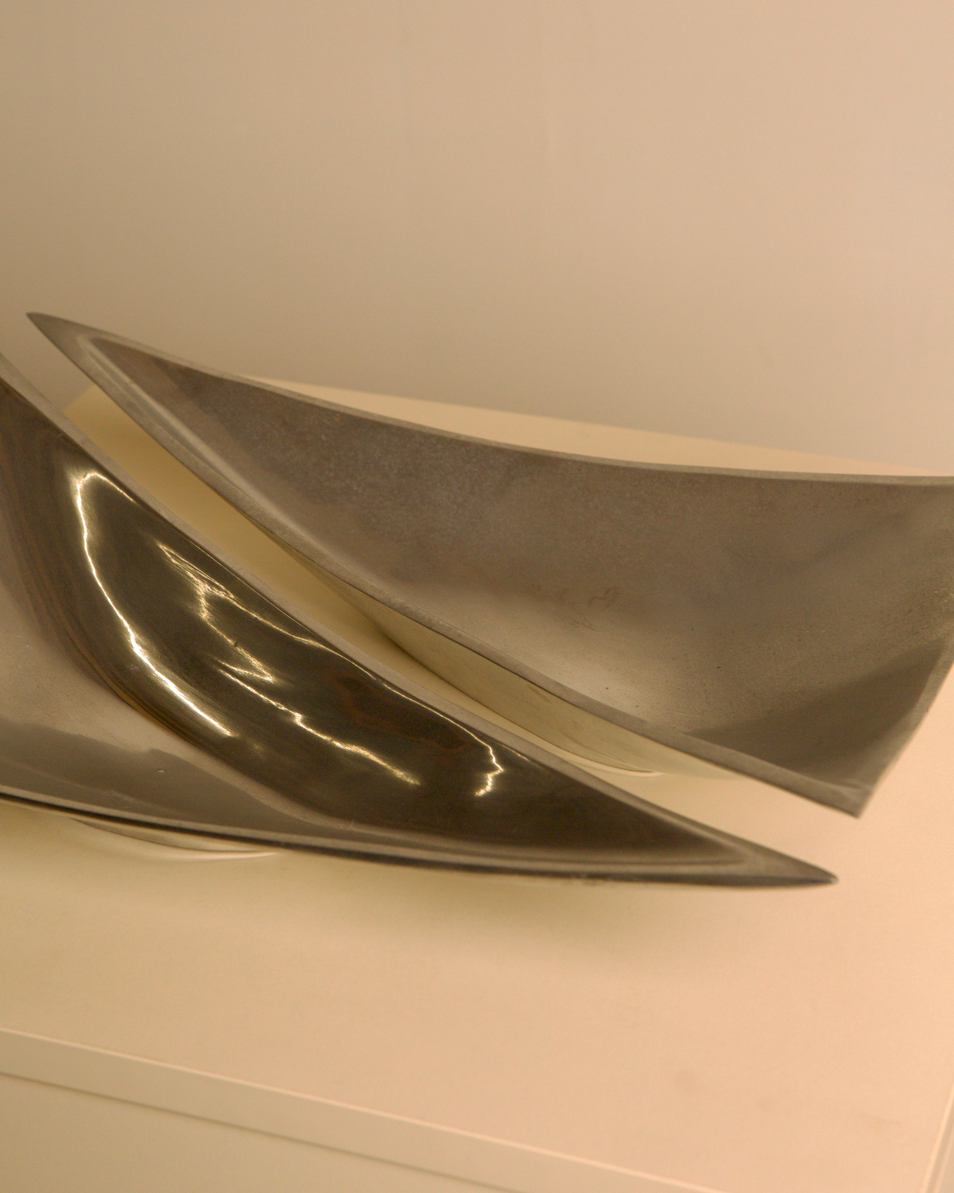 Pair of Italian "Triangle" aluminium catch-alls, 1980s — detail view