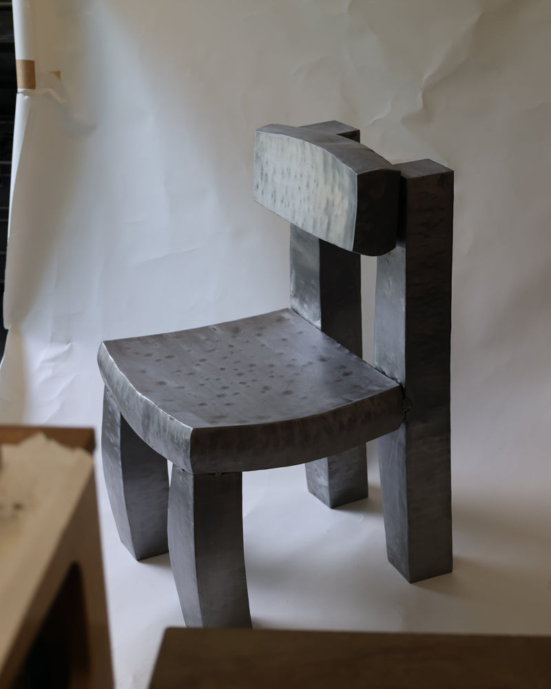 Handcrafted Joe chair in dark hammered metal by Jesse Butterfield