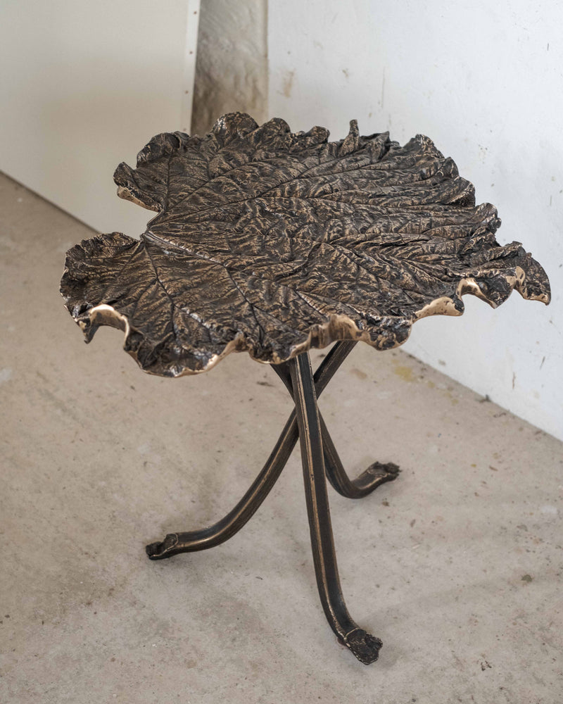 Bronze rhubarb leaf side table with curved metal legs