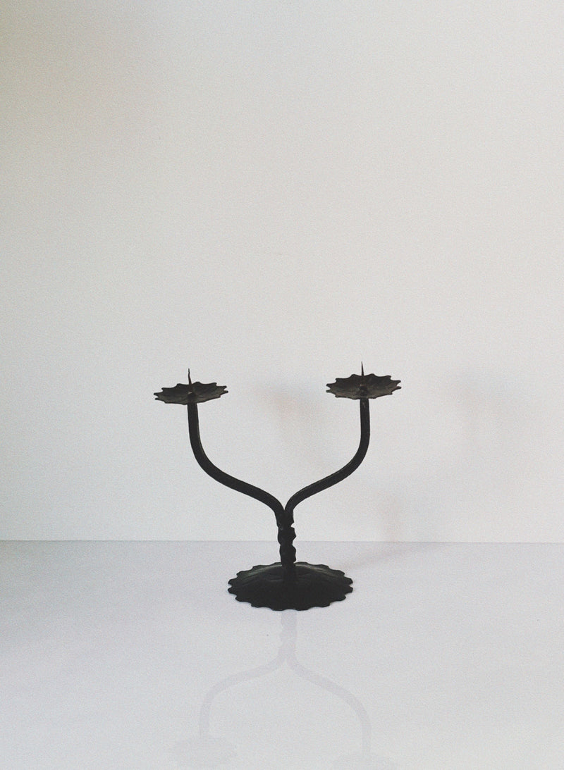 Elegant Polish metal candleholder with curved twin arms on base