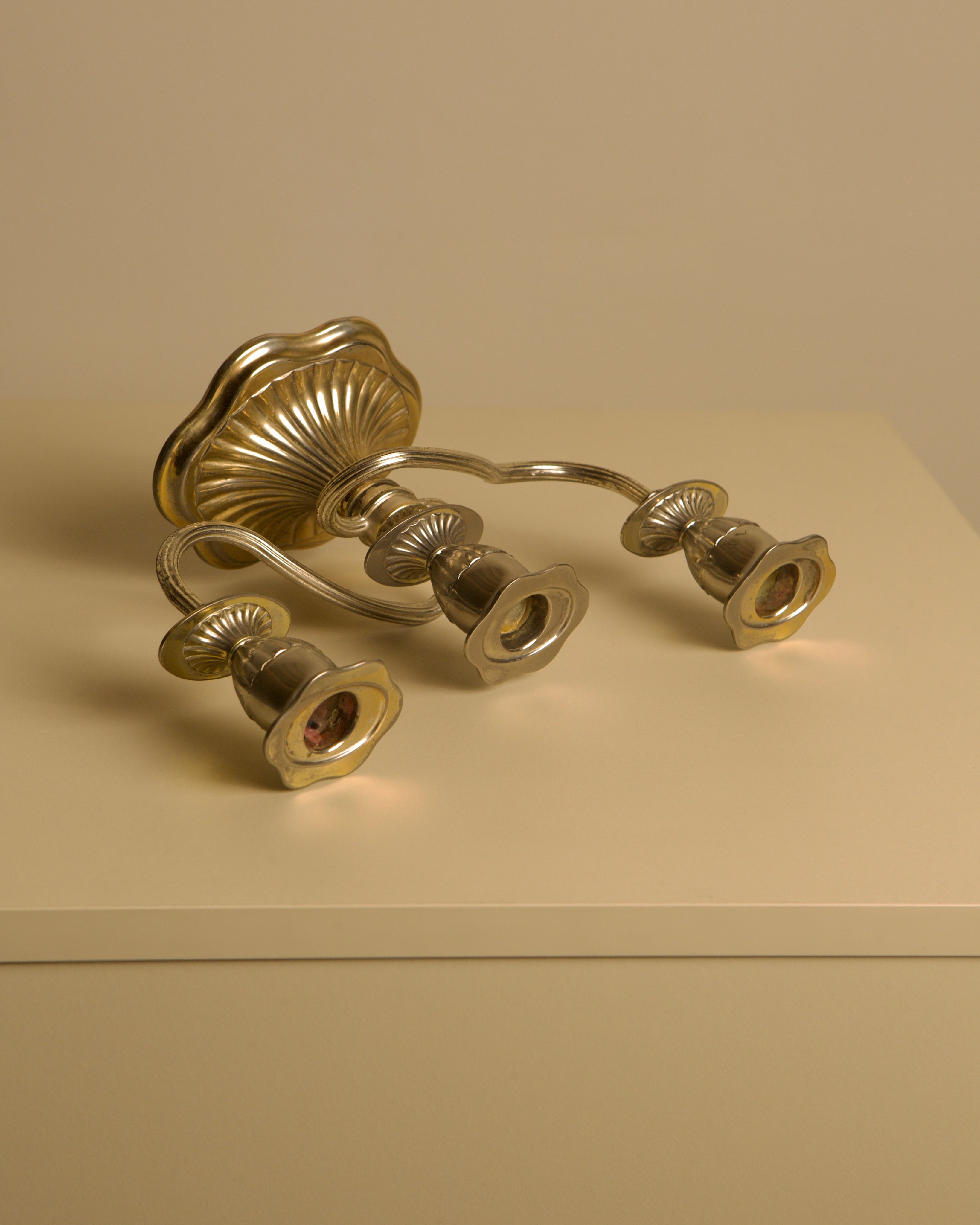 Italian "Medusa" Metal Candleholders, 1960s — angled view on neutral background