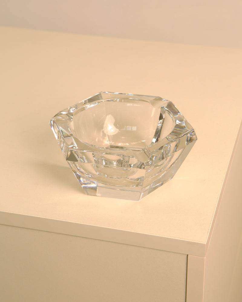 Clear crystal Italian diamond-cut ashtray from the 1960s on beige surface