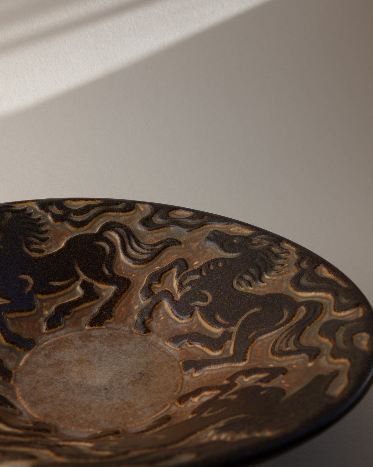 Marianne Starck for Michael Andersen & Søn Stoneware Bowl with Galloping Horses (c. 1960s) — lifestyle setting