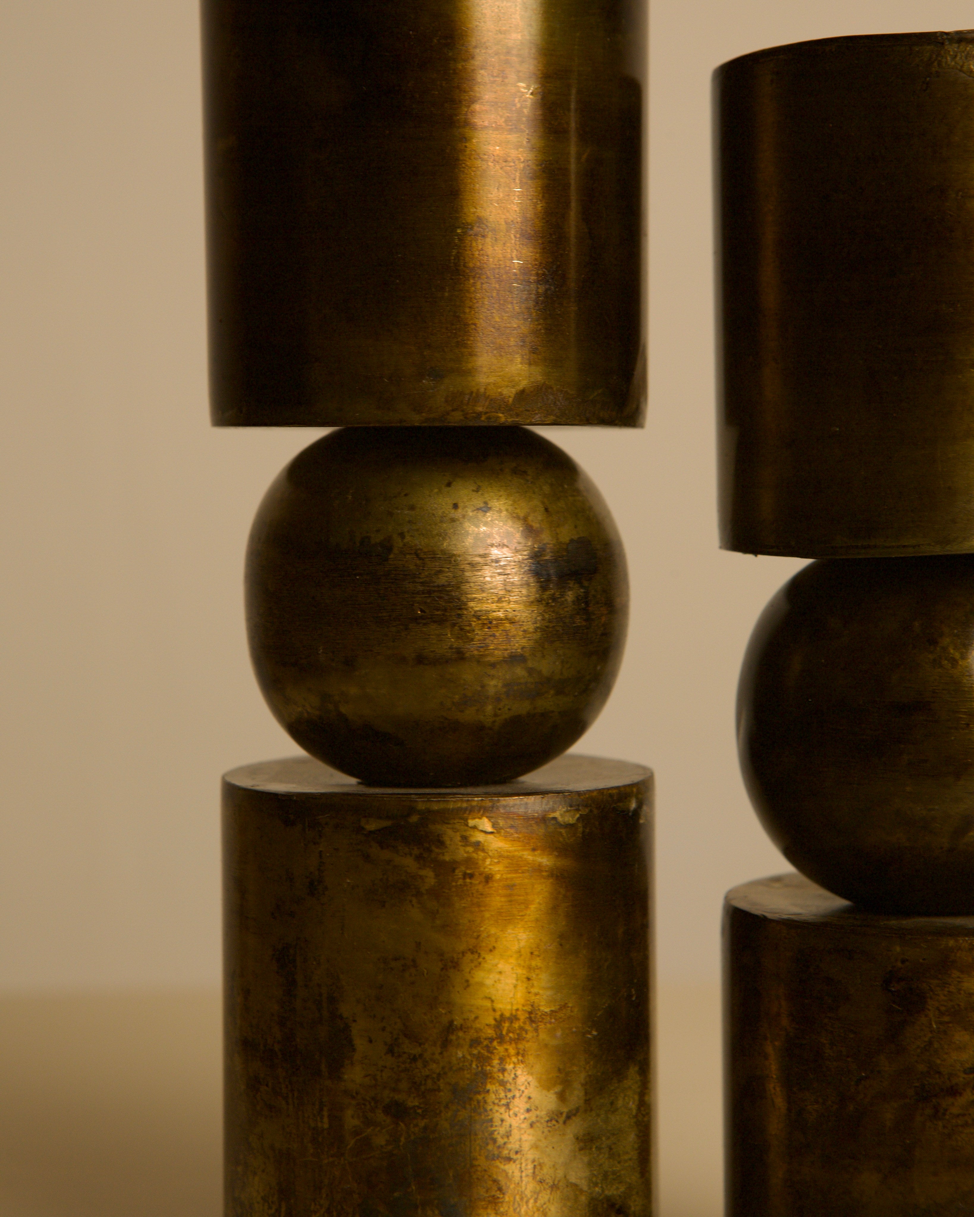 Pair of Danish copper-plated metal candlesticks from the 80s — close-up
