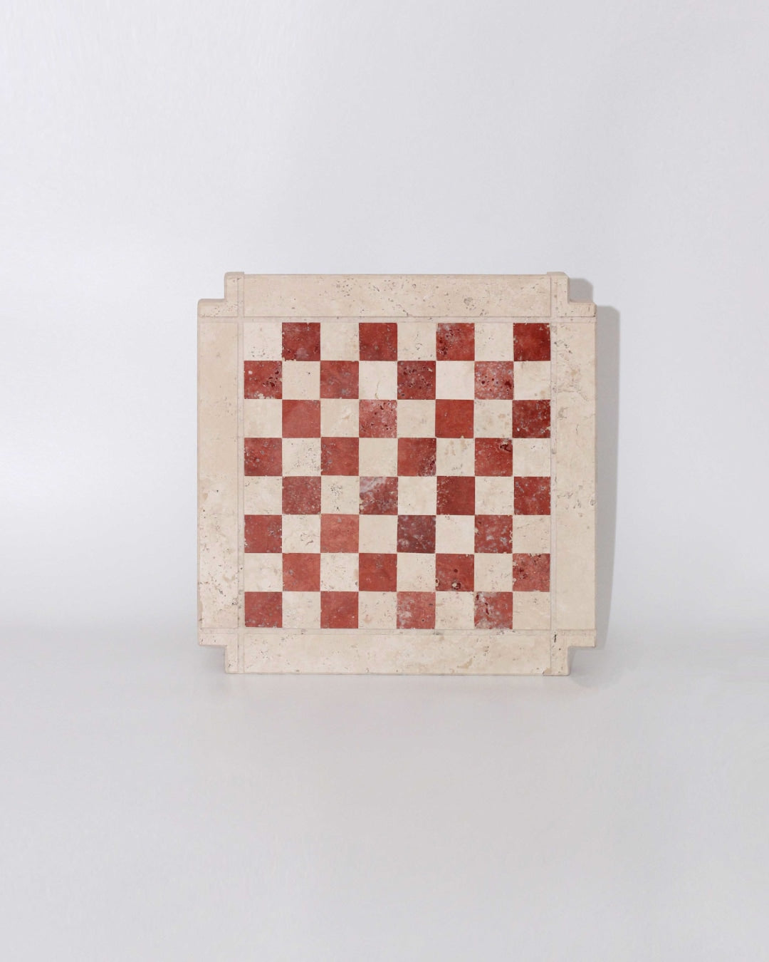 Modernist Chess Set — top view of red and cream marble board
