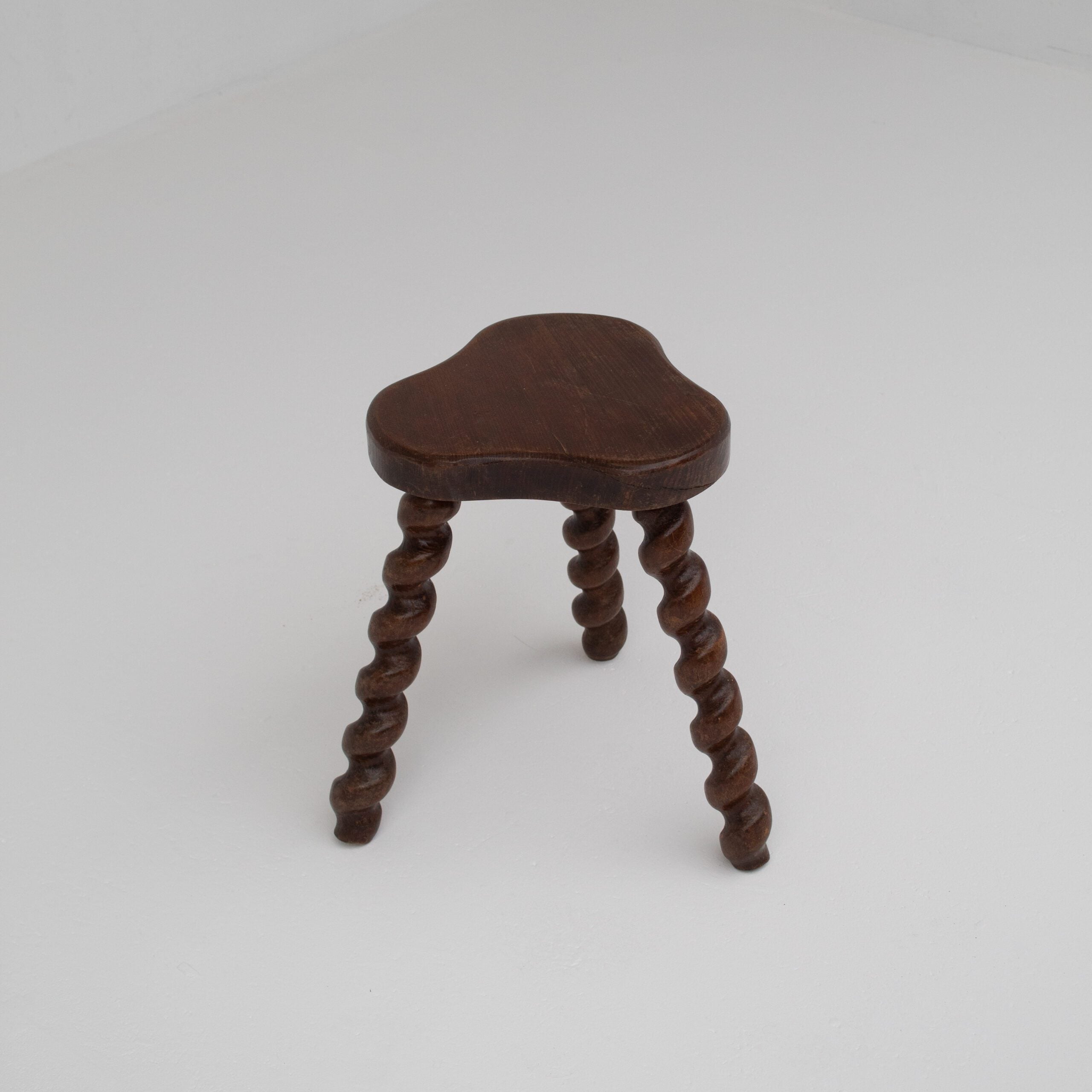 Set of 4 Primitive Oak Stools with Spiral Legs — side angle