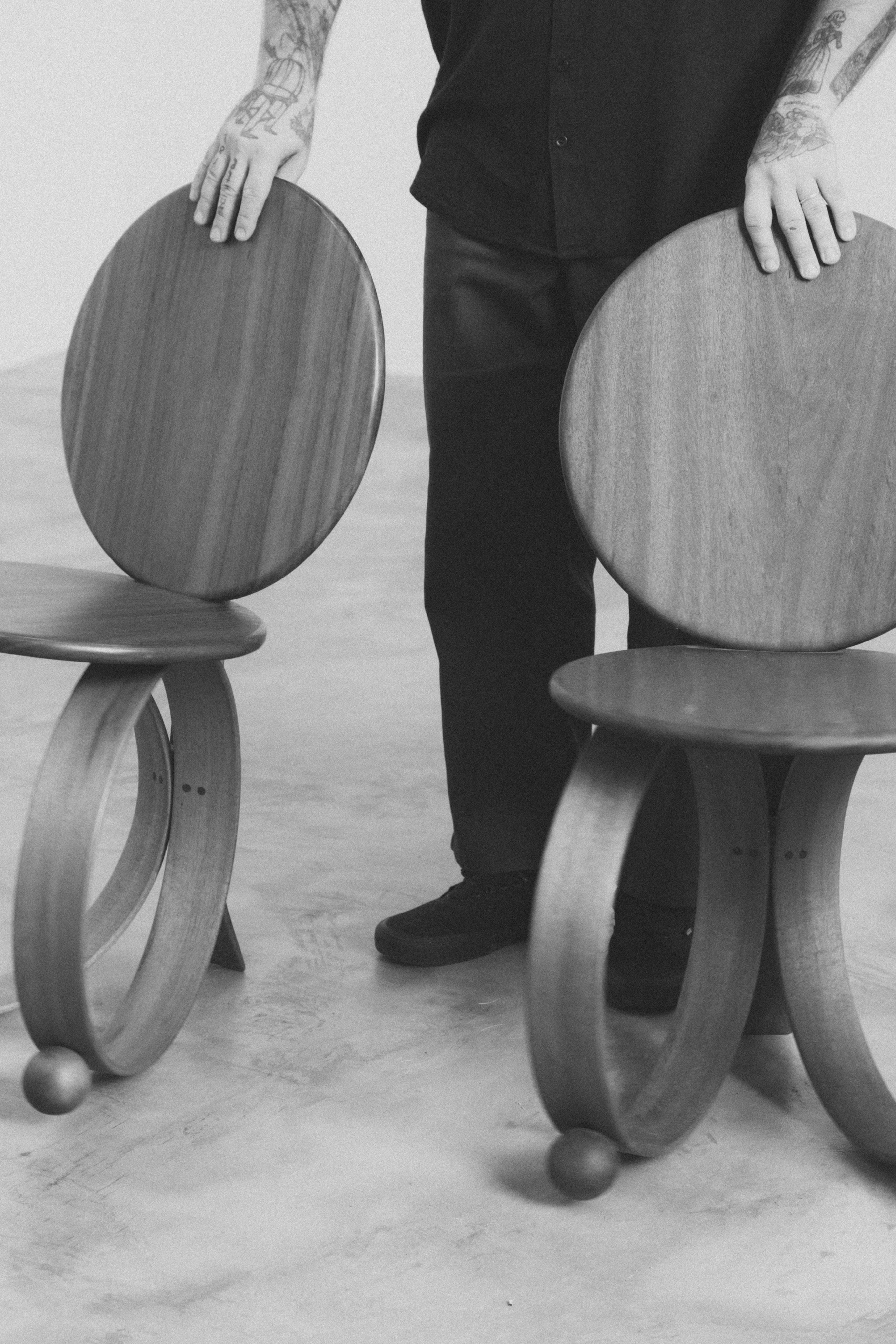 Yara' Chair — top view of round wooden seat with curved legs