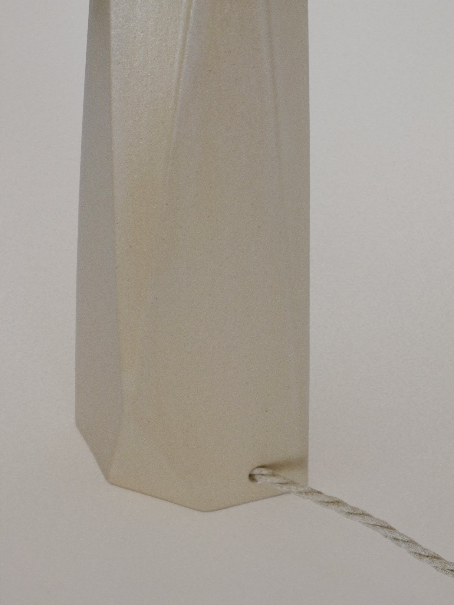 Close-up detail of Liss off white table lamp base and cord