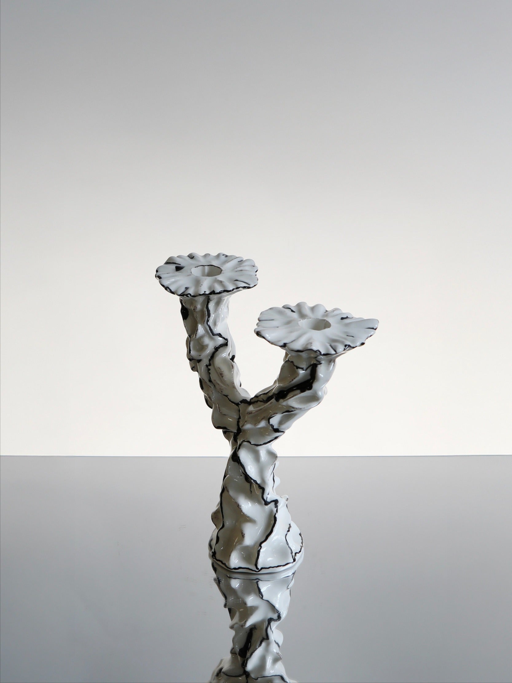 Two Wishes Candle Holder — close-up of white ceramic with textured details