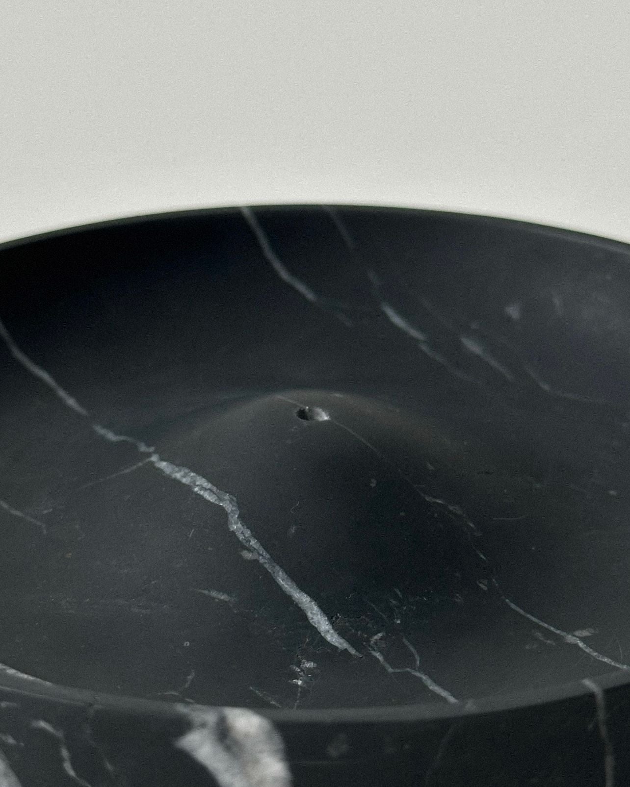 ALTAR' incense holder — close-up of black marble texture