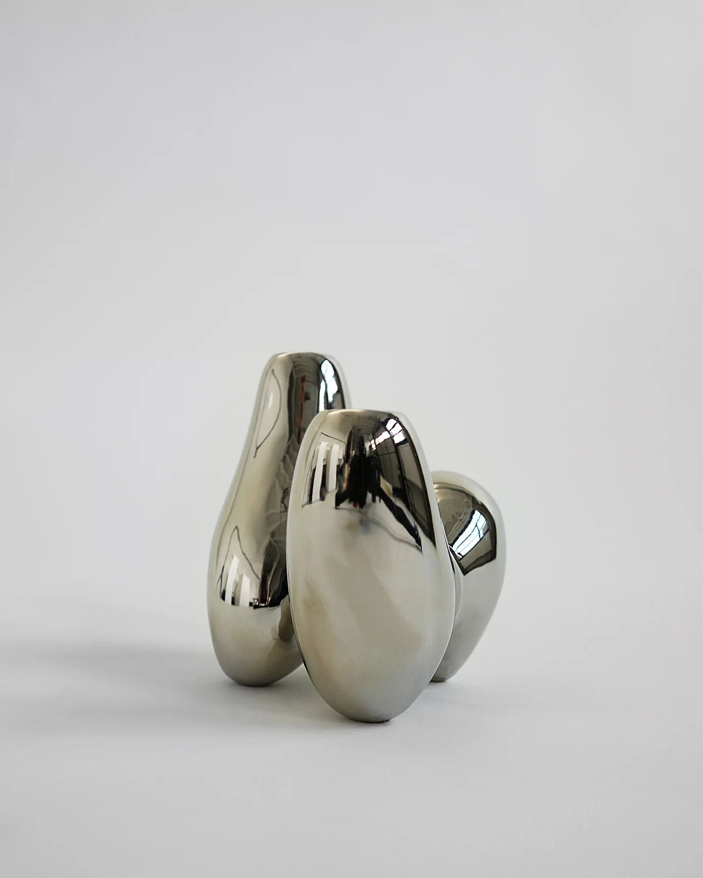 Unity Candleholder - Silver — angled view on neutral background