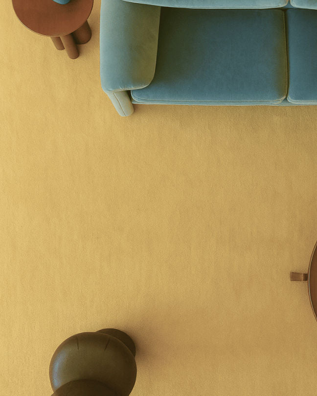 Rug 100% Wool New Zealand - Beurre — overhead view on yellow floor