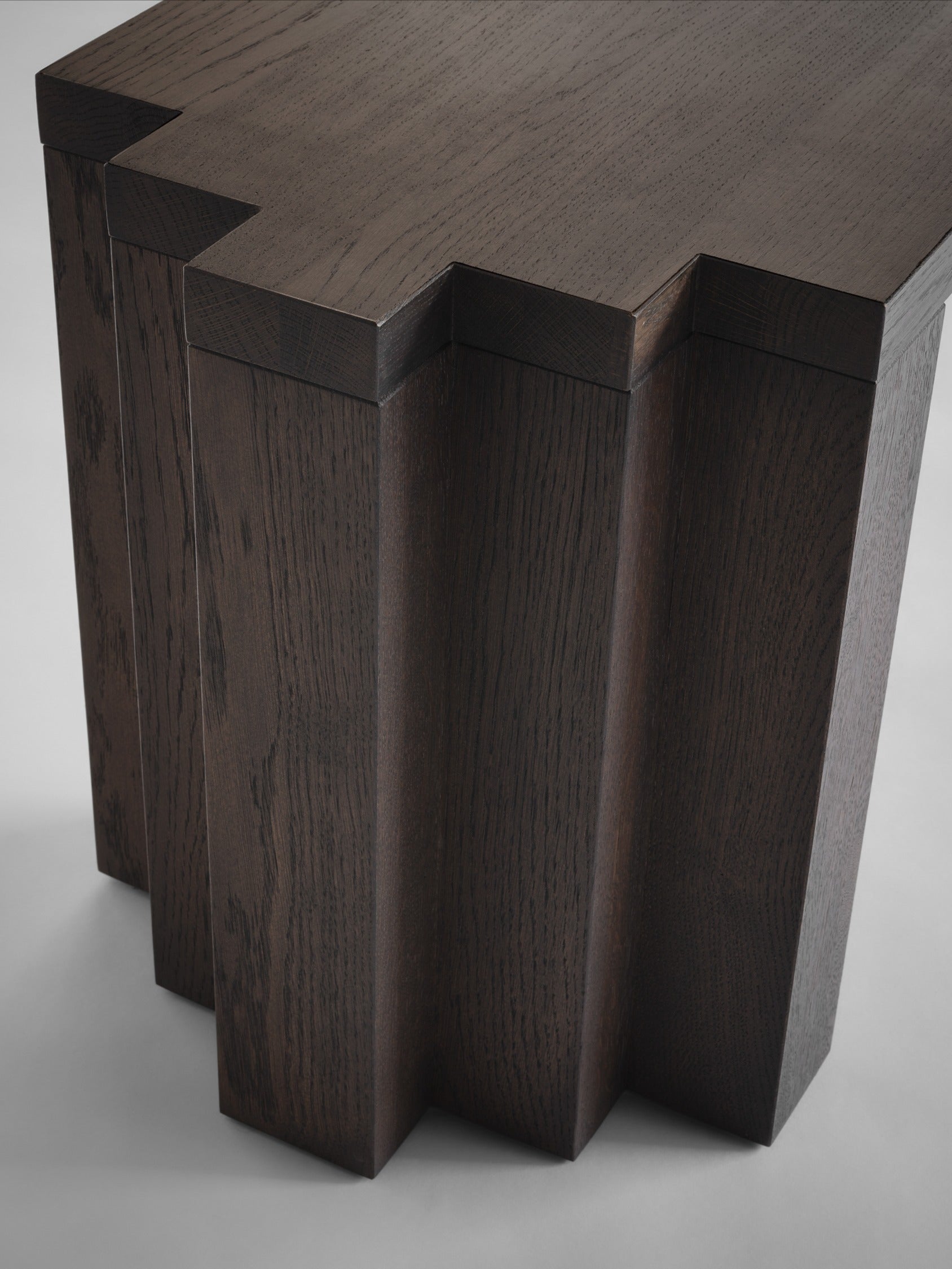 Cadence Bench — close-up of dark wood with geometric edges