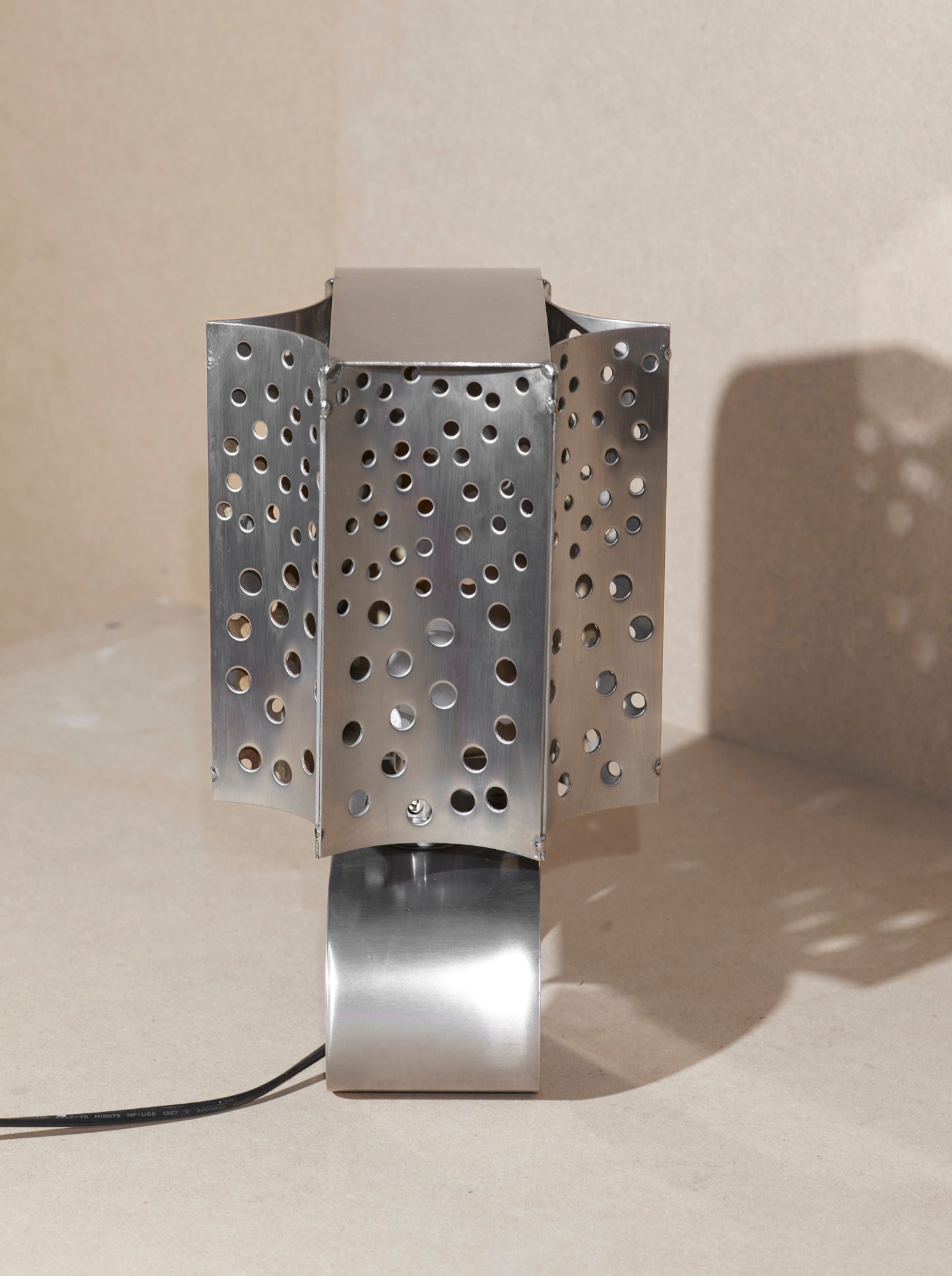 One of a Kind French Artisanal Stainless Steel Table Lamp Vintage Circa 1970 — angled view highlighting perforated shade desi