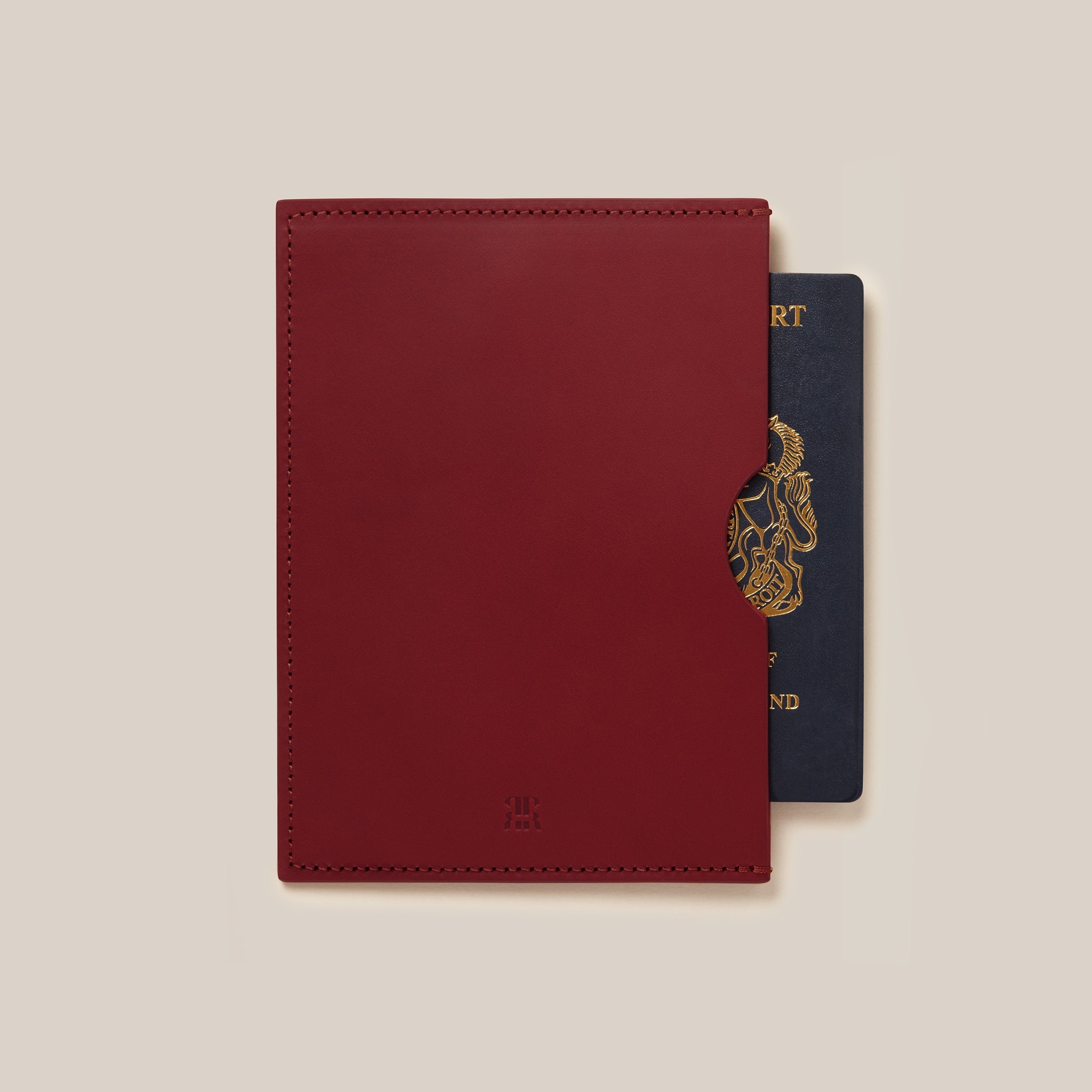 Leather Passport Holder — close-up of rich burgundy leather with passport inside