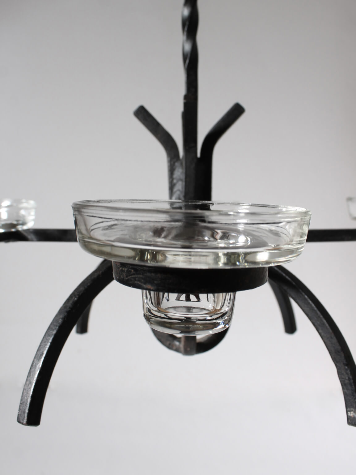Cast Iron Brutalist Chandelier — top view showing glass candle holders