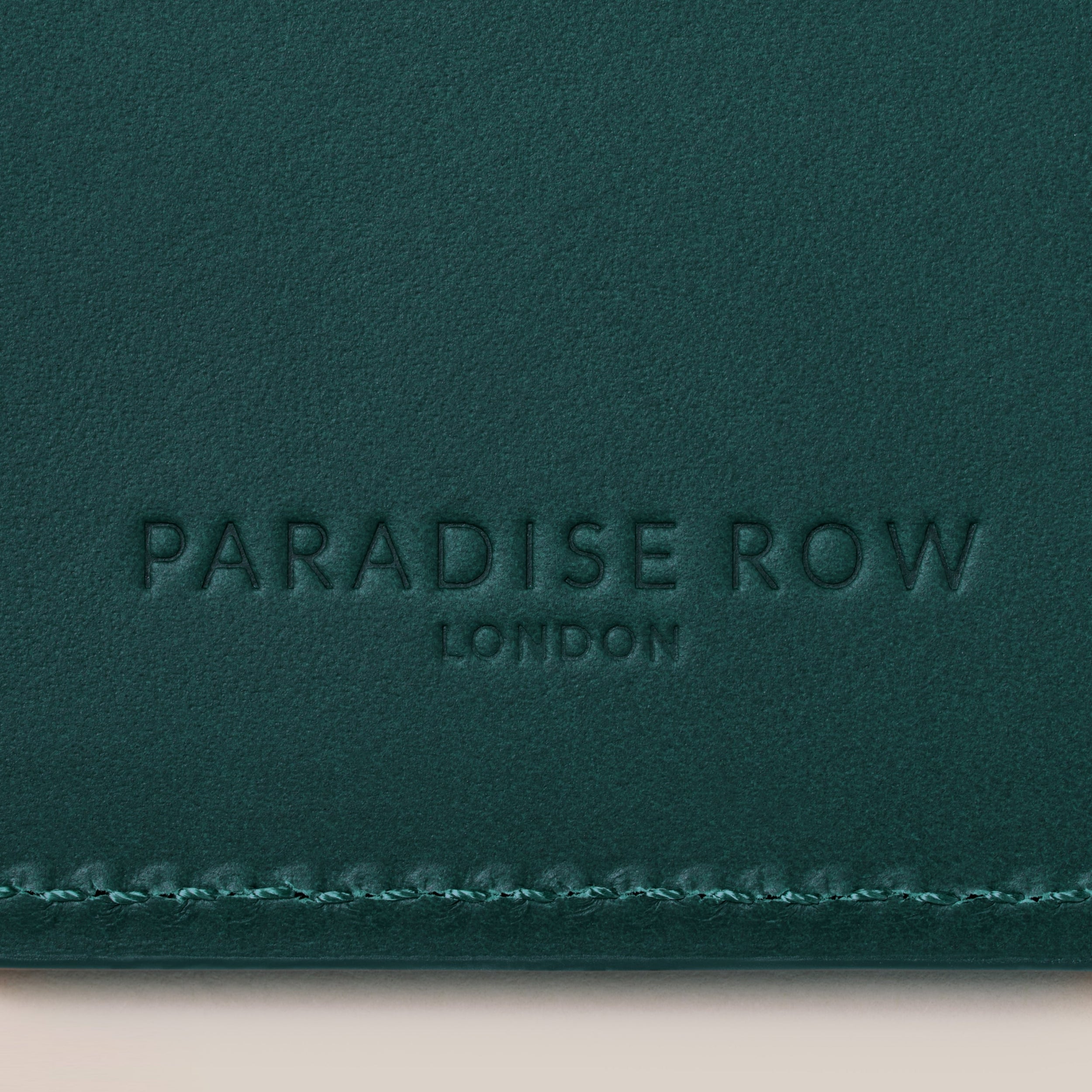 Leather Passport Holder — close-up of green leather texture