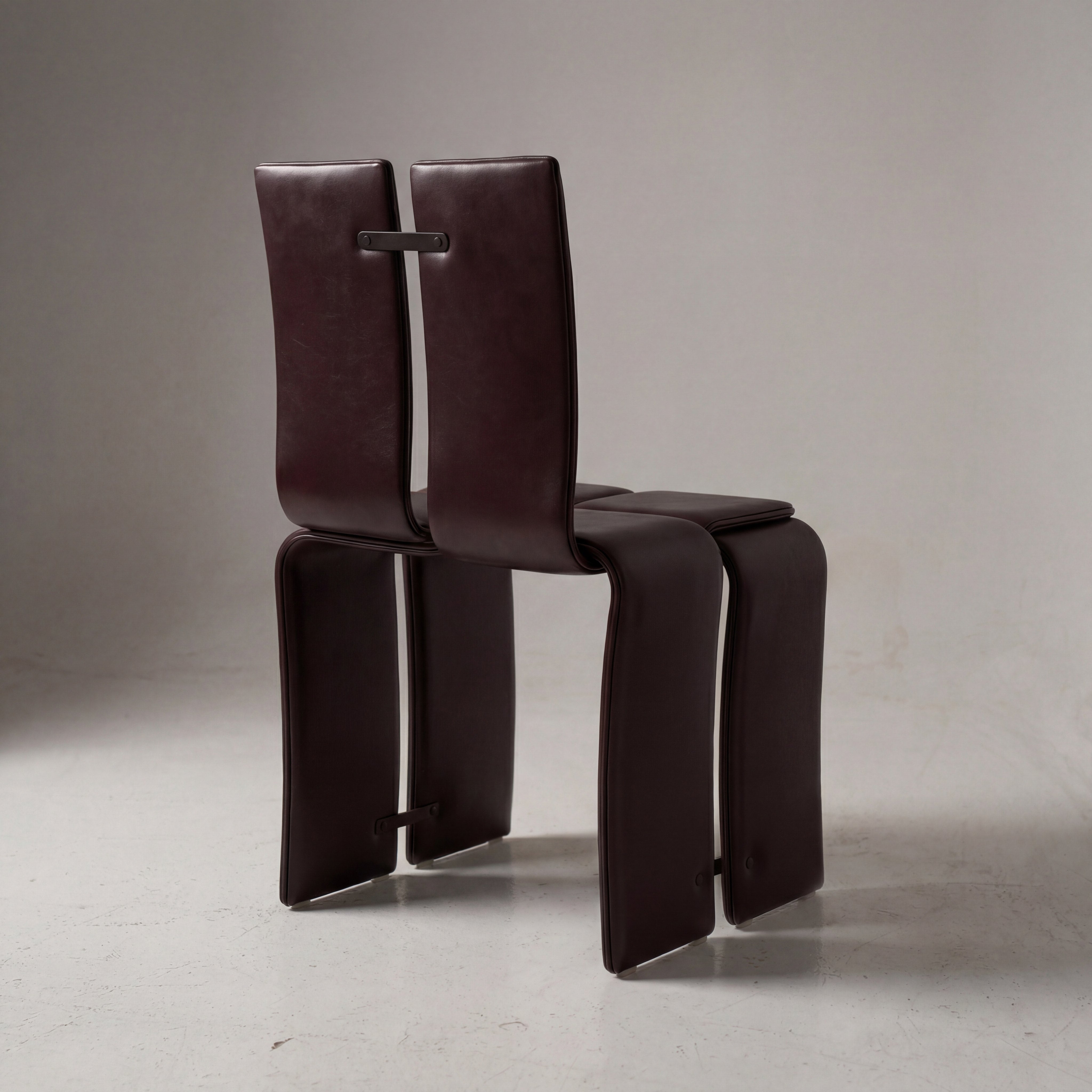 Weaving Chair - Leather — side view showing dark leather finish
