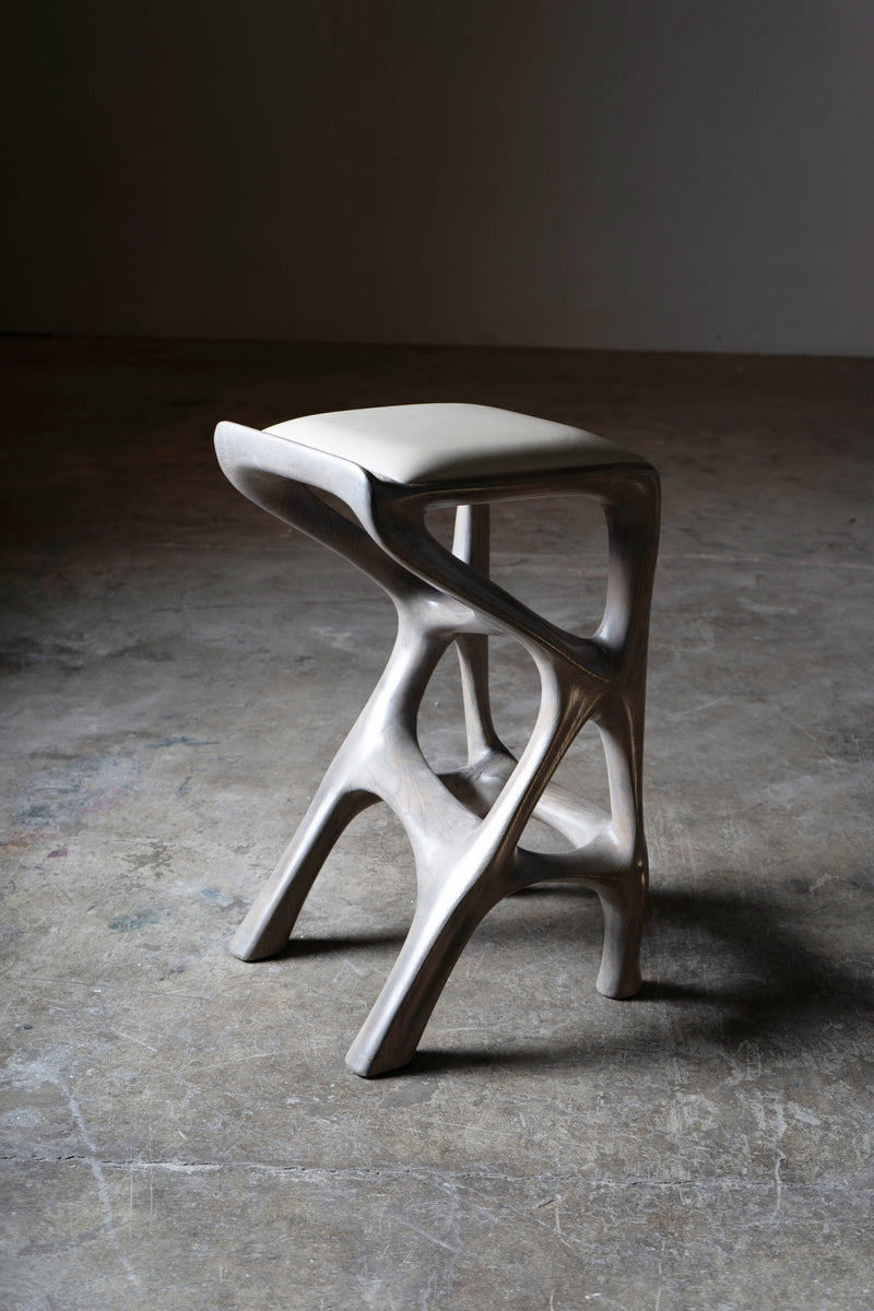 Sculptural Chimera Stool in Ash Wood with Upholstery — detail view