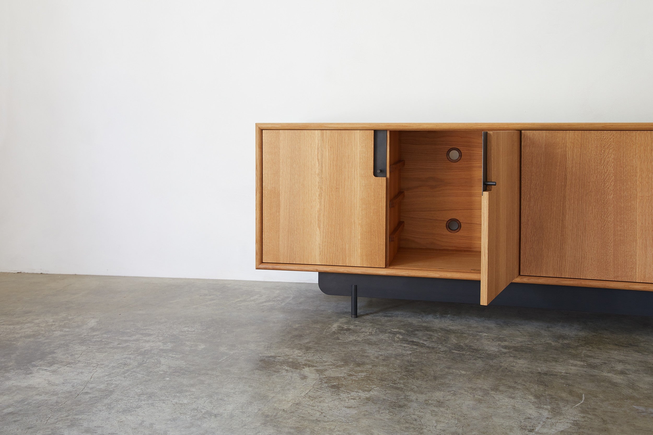 Ridge Cabinet — side angle showing open oak doors and interior