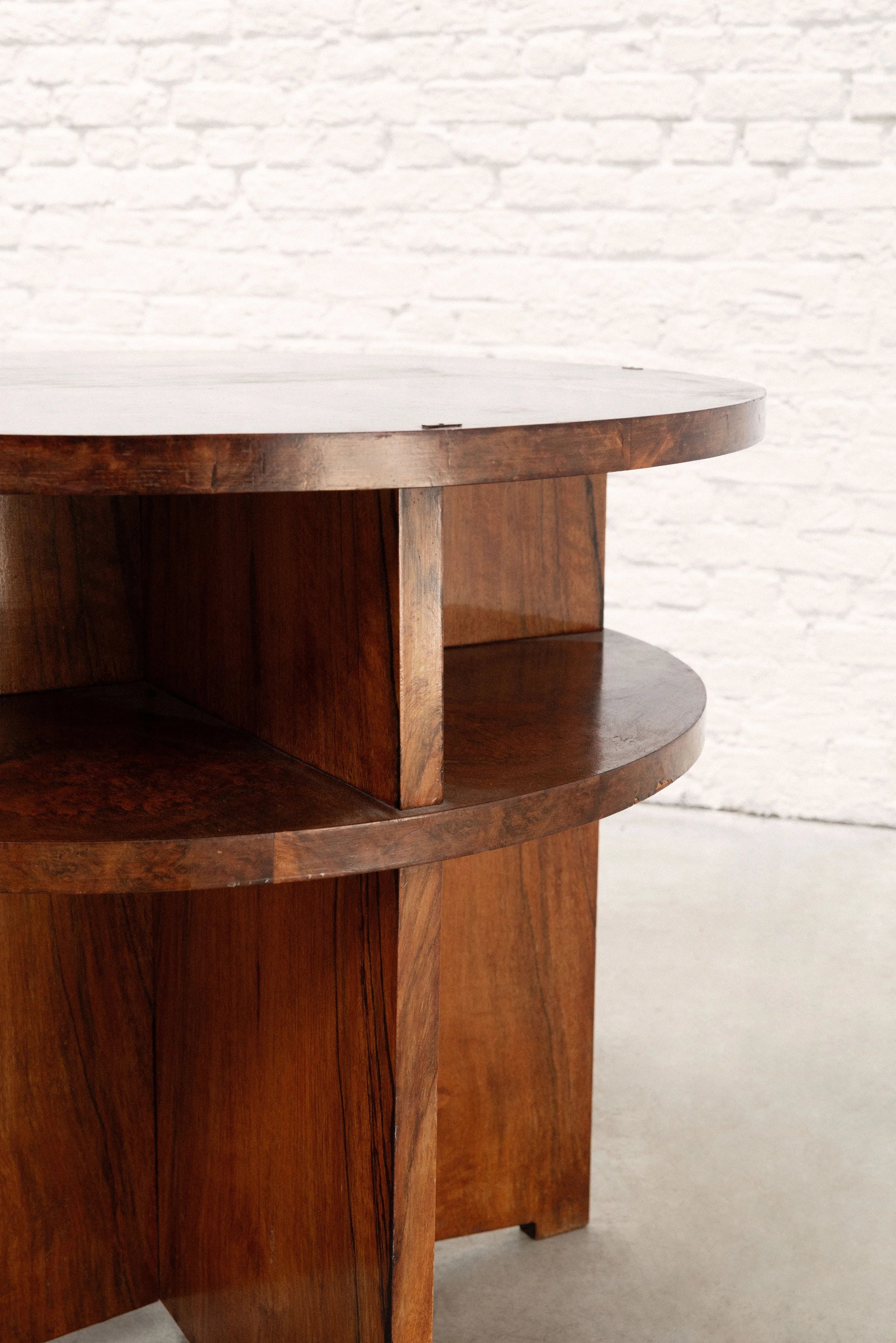 French Modernist Circular Coffee Table with Integrated Shelving, c. 1935 — lifestyle setting