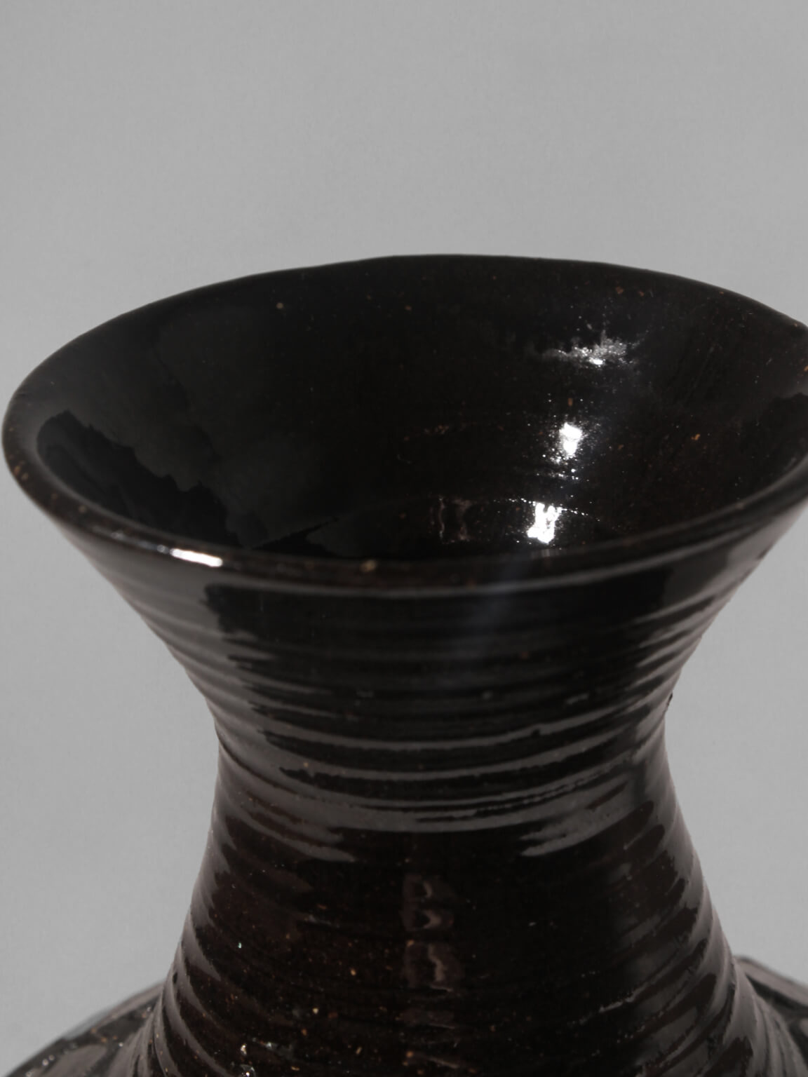 Mid-Century Ethnic Brown Ceramic Vase, Signed — lifestyle setting