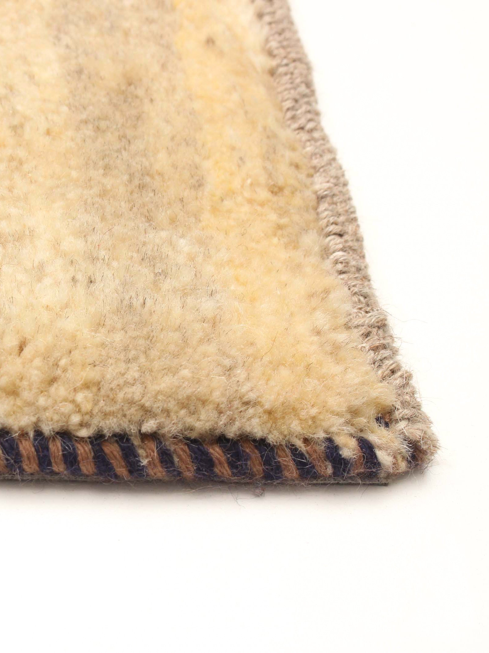 Gabbeh Rug in Midnight 119 x 183 cm — side angle showing wool texture and border
