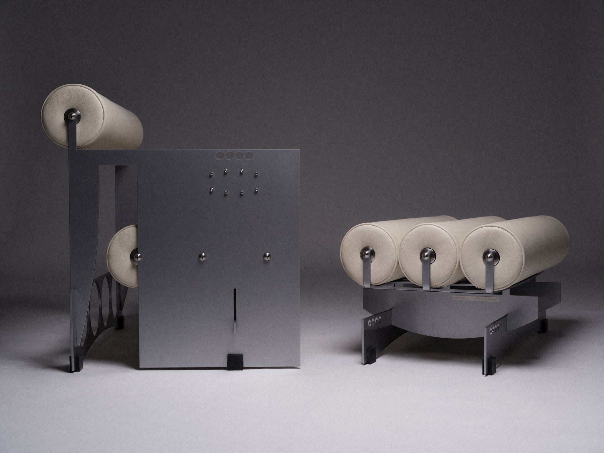 Ottoman Bassa — modern design in gray with cylindrical cushions