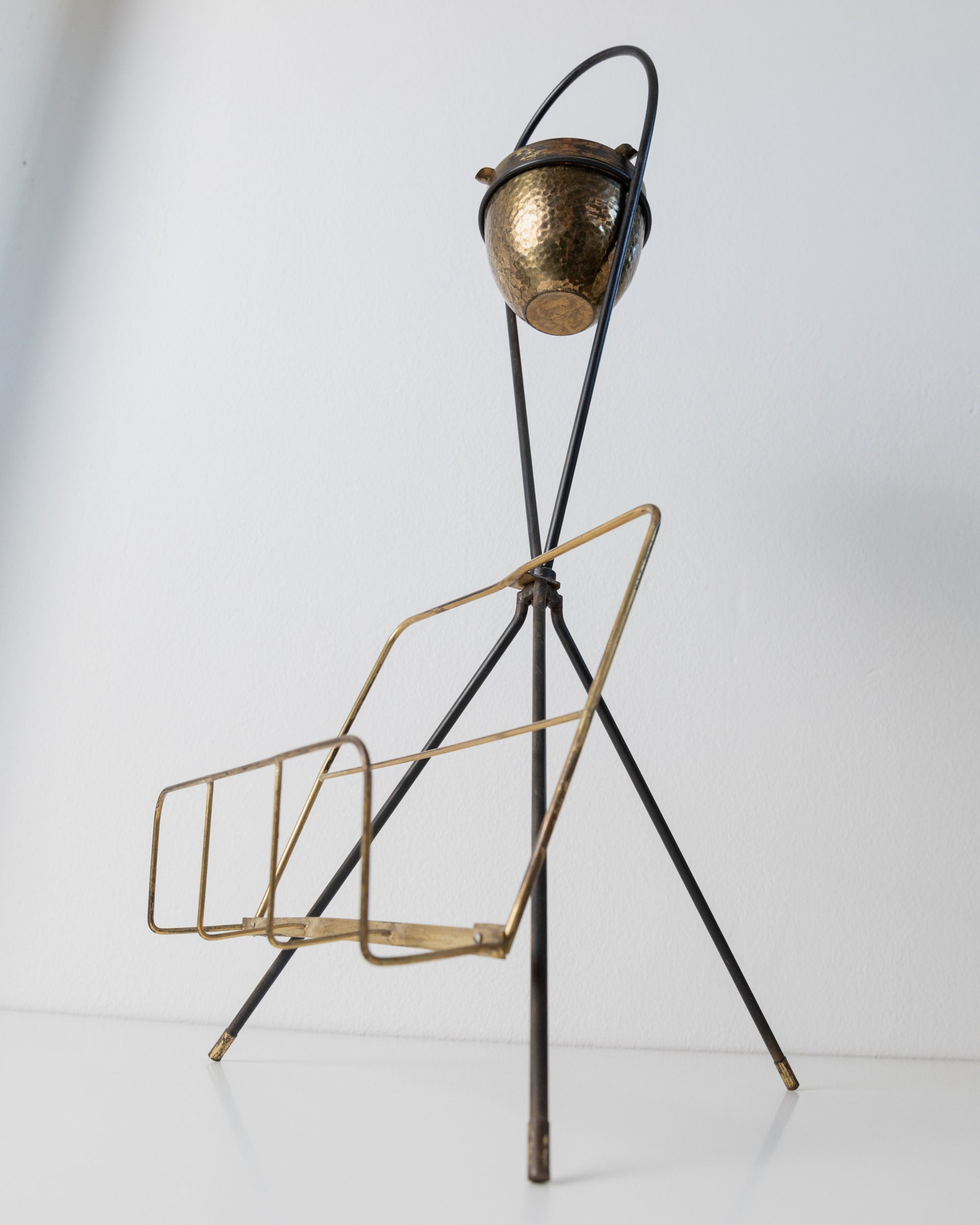 Brass Magazine Rack and Ashtray 1960s — angled view on white surface
