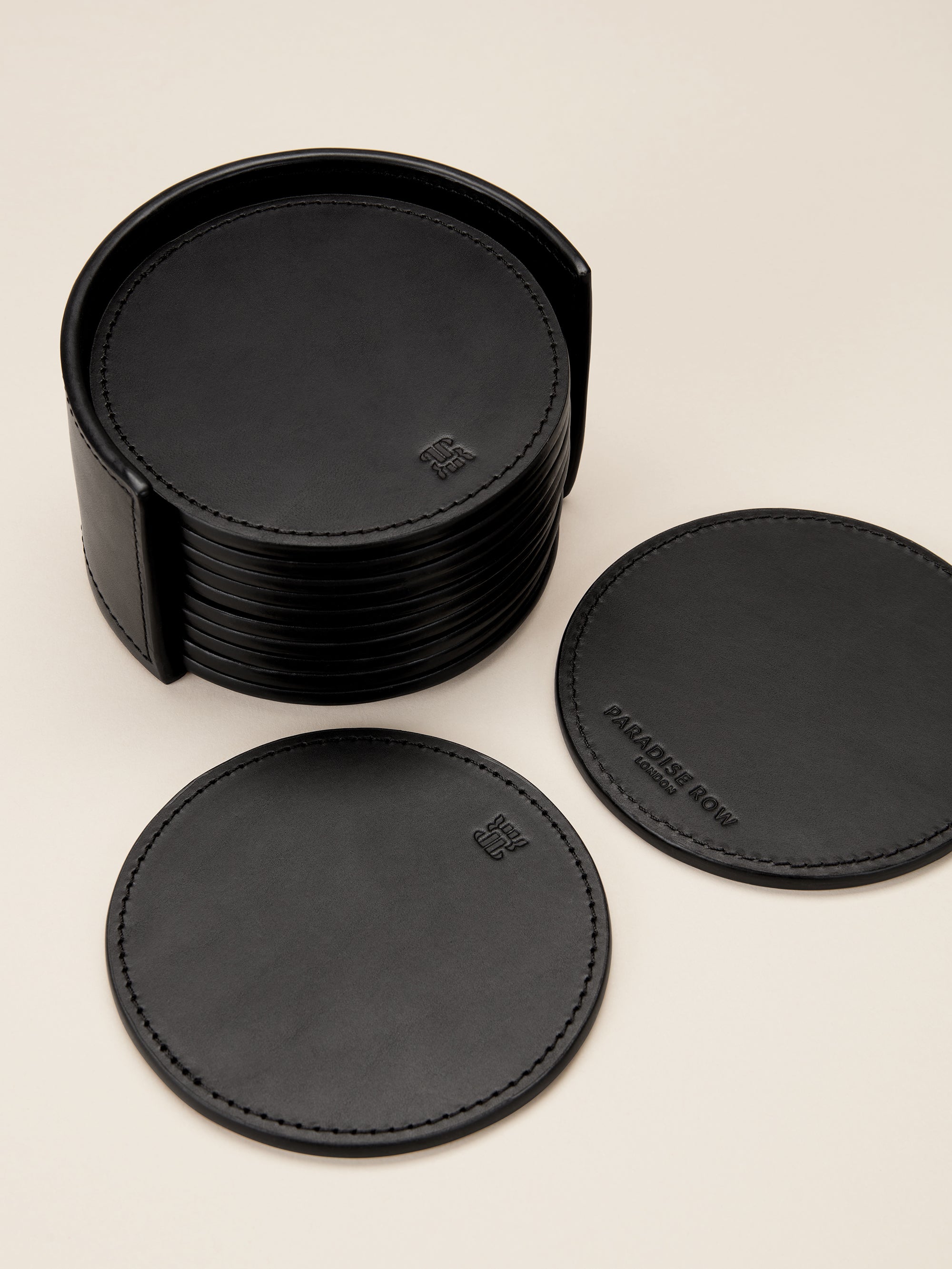 Leather Coasters in Holder (set of 12) — back view of black leather coasters