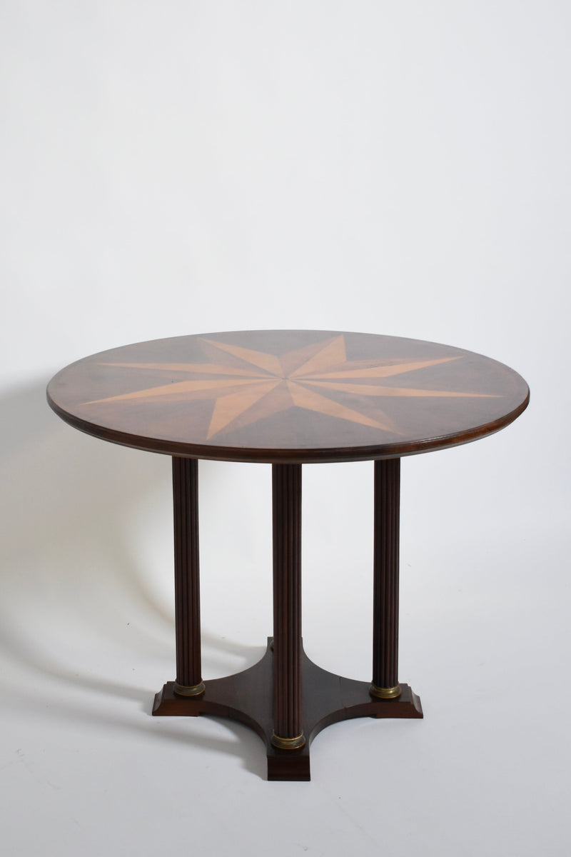 Neoclassical Star Marquetry Pedestal Table — angled view highlighting wood grain and star design