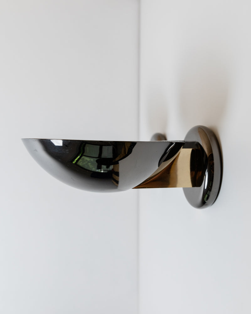 Chrome-finished vintage metal wall lamp detail view