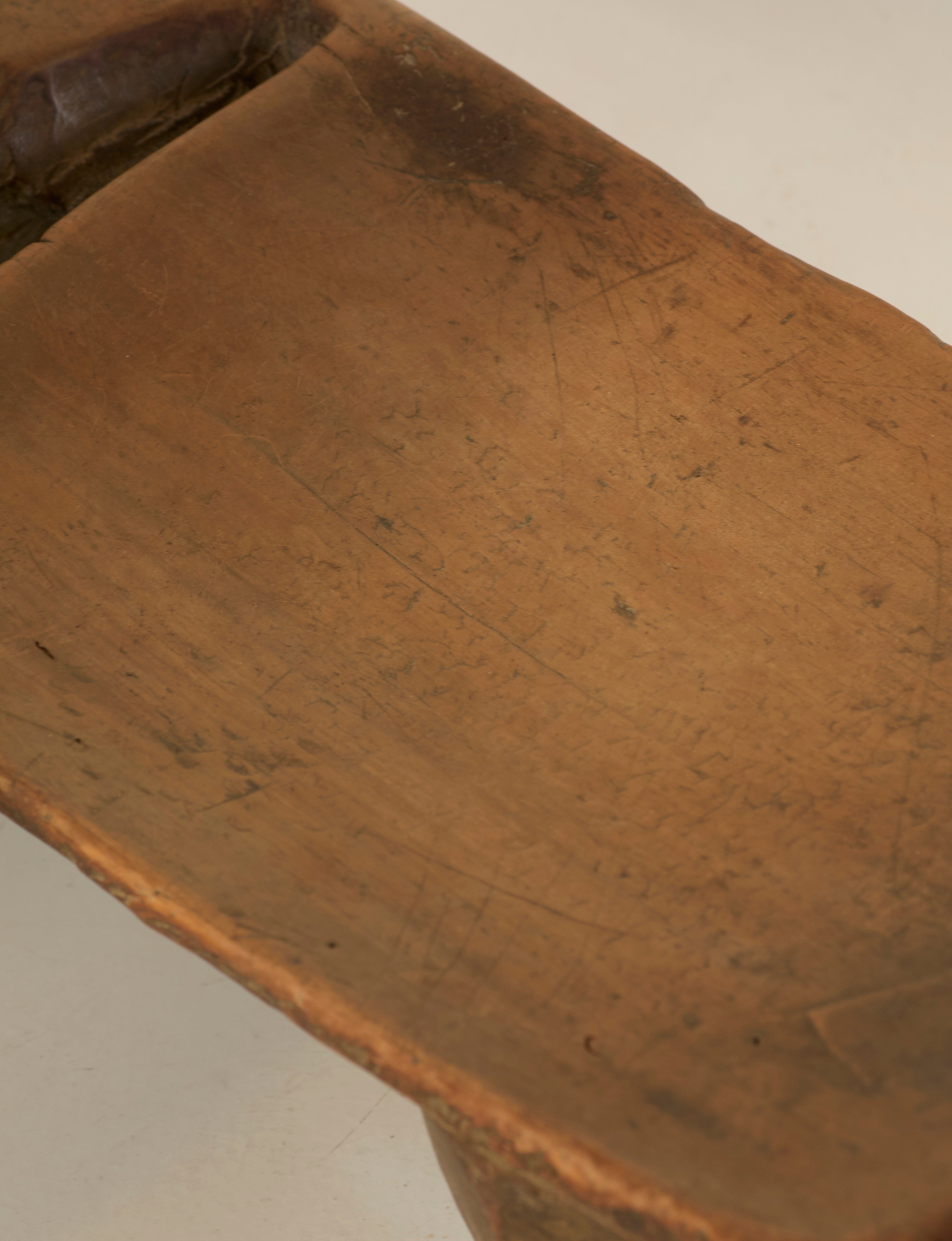 Mid-Century African Senufo Stool / Side Table in Solid Wood — close-up of textured wooden surface