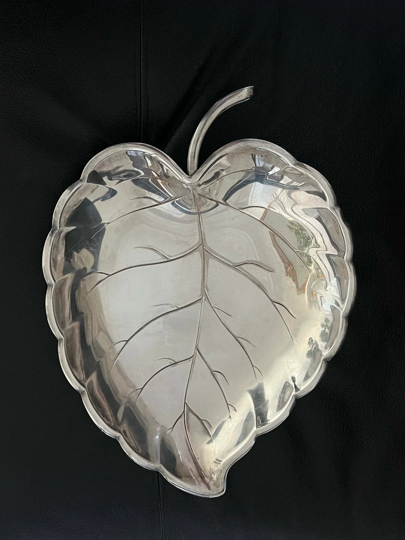 Silver leaf-shaped decorative dish with engraved veins detail