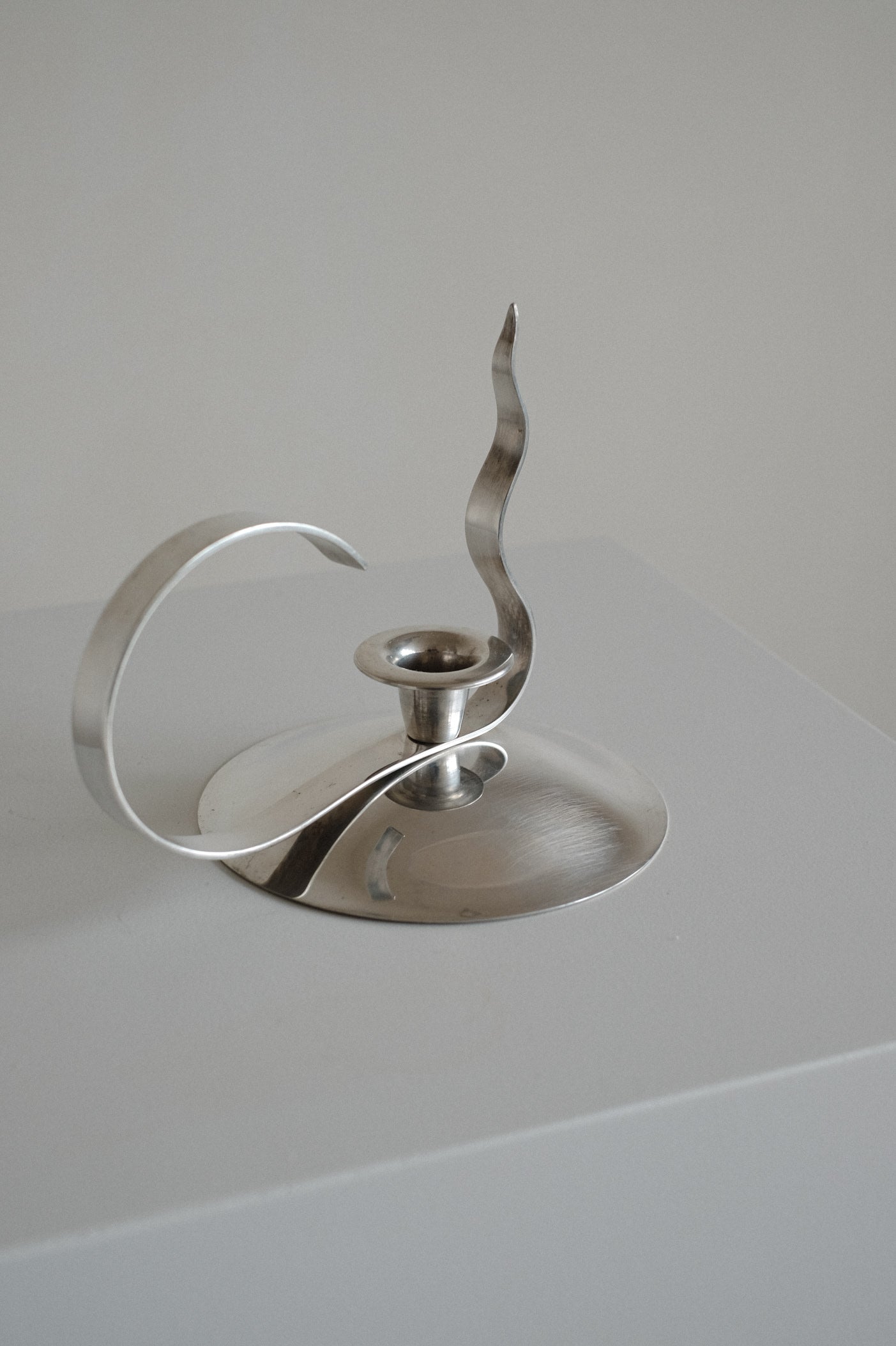 Silver-Plated Candle Holder — back view on minimalist surface