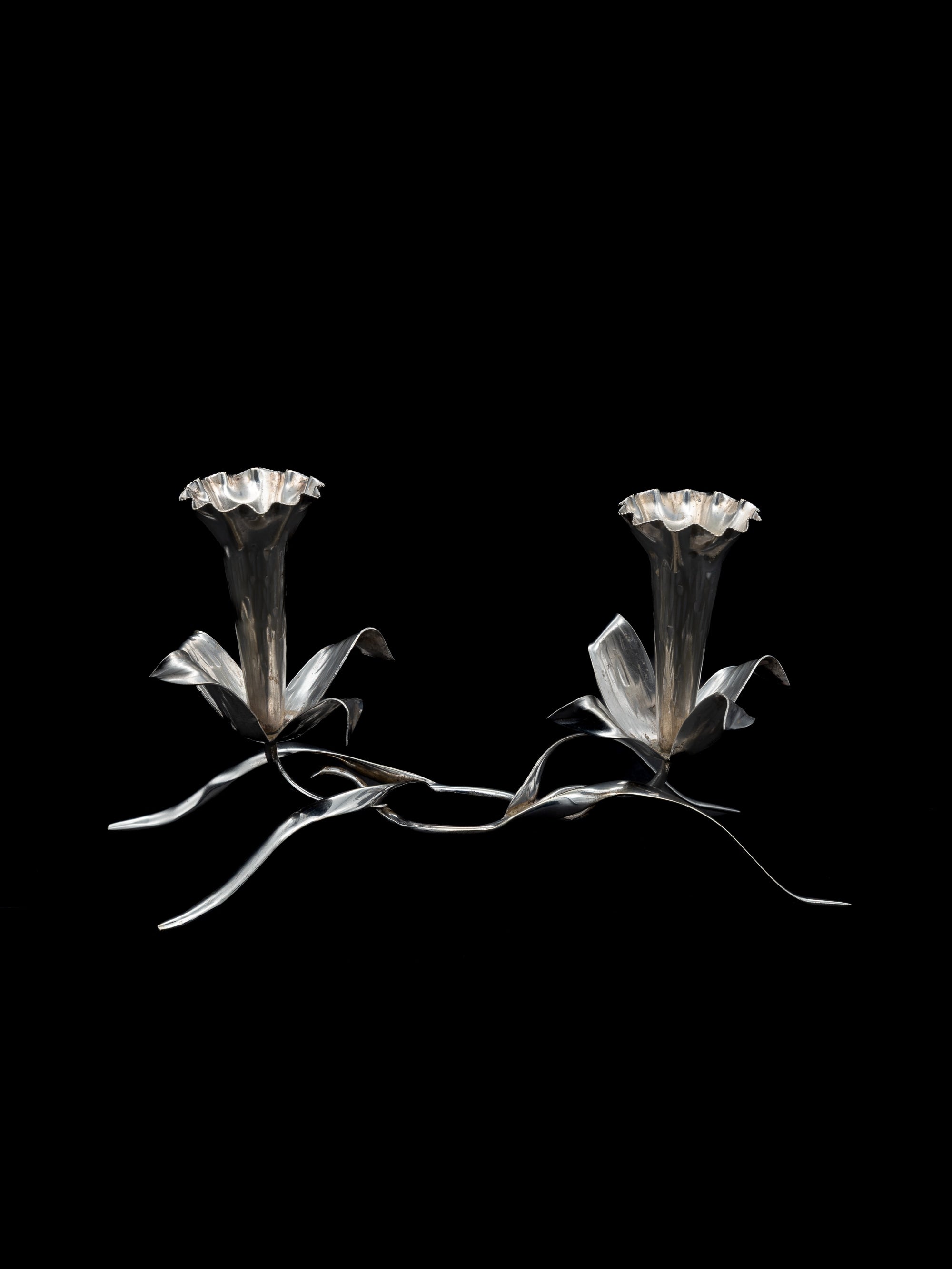Art Nouveau Silver-Plated Lily Candleholder, England, c. 1900s — side angle highlighting floral design and silver finish