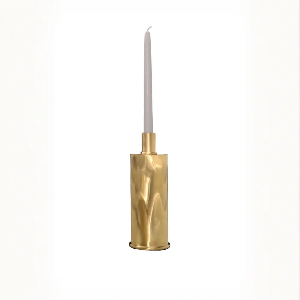 Tall Brushed Brass Candle Holders in Brushed natural brass — front view with white candle