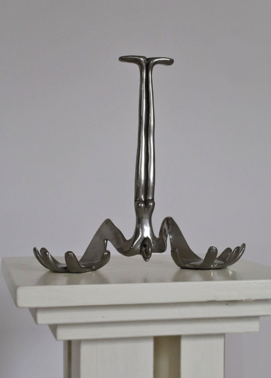 Carrol Boyes Sculptural Bottle Holder in Polished Metal — detail view