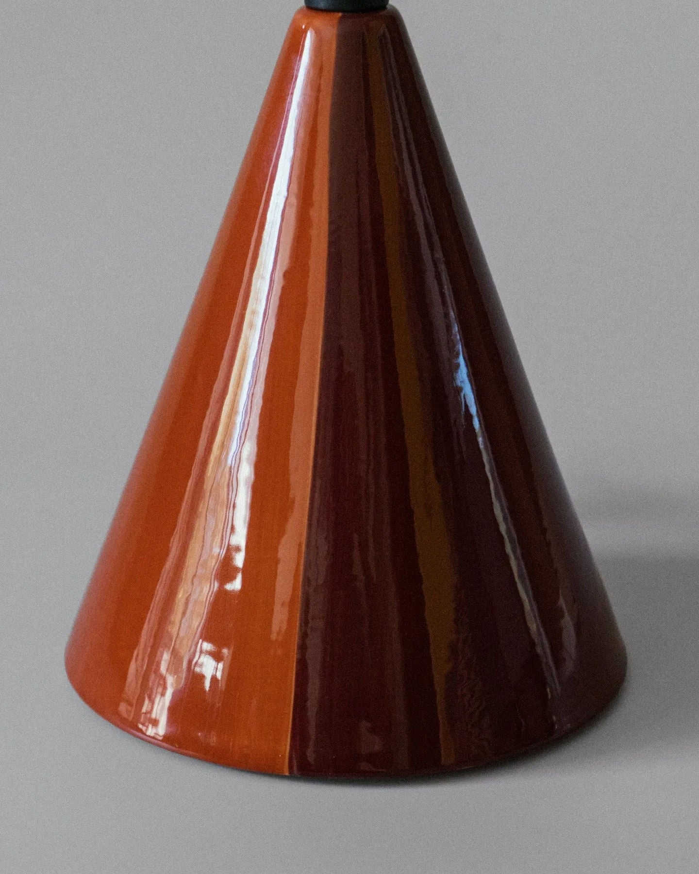 Caterina" Table Lamp - Cognac — side angle of glossy conical base