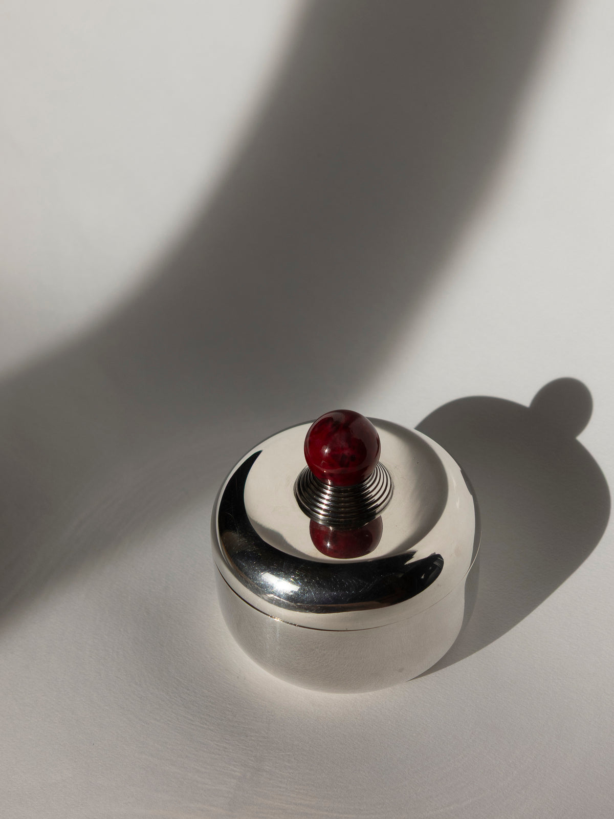 Puiforcat French Art Deco Box with Ruby Red Lacquer Finial — side angle