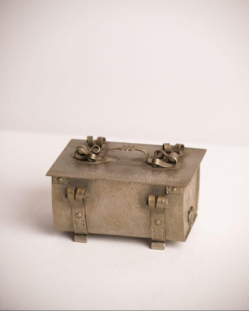 Arts and Crafts Hammered Metal Trunk Casket — Jugendstil Jewellery Box with Green Felt Interior — lifestyle setting