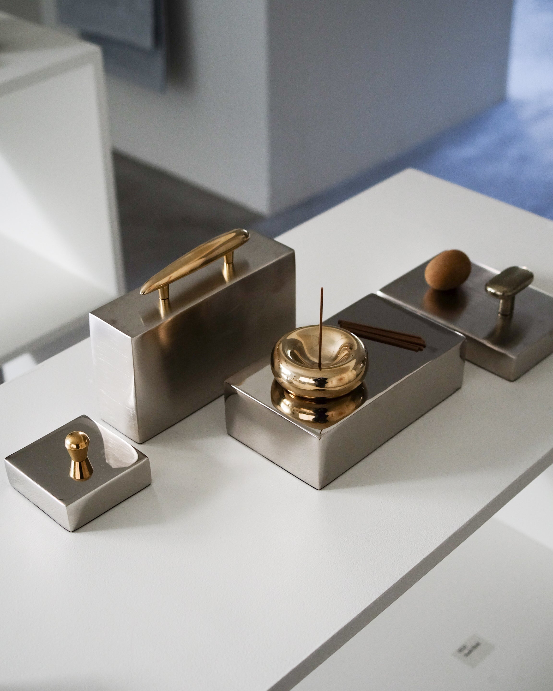 MOMI Cabinet Pull — close-up of brushed metal texture on display