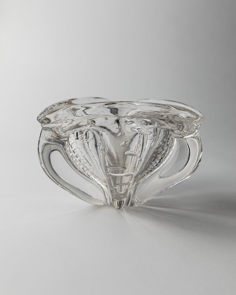 Clear Murano glass bowl with sculptural curved form and textured interior detail