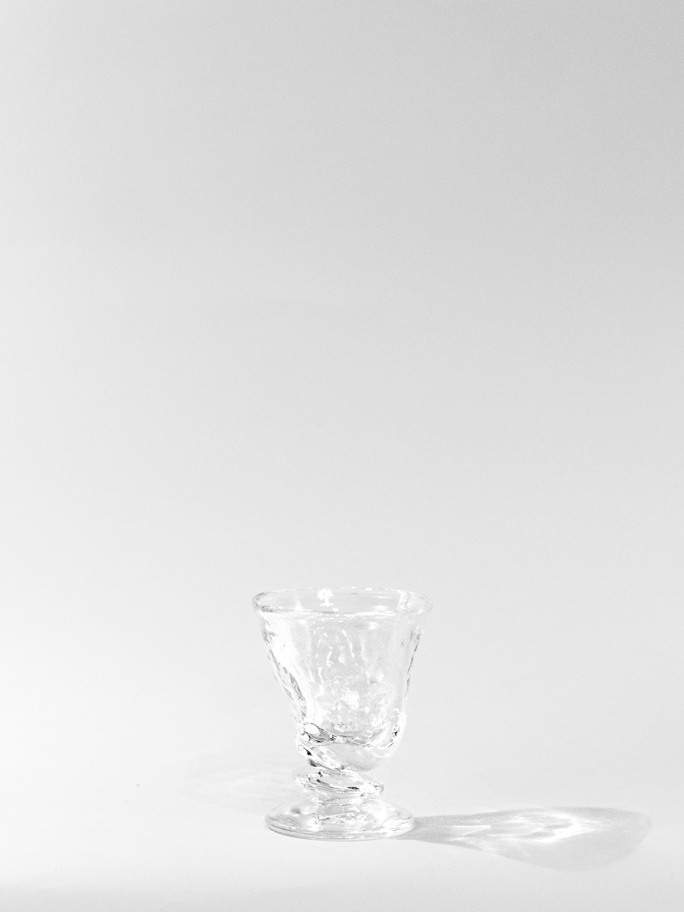 Blown Free-shaped Glass — top view on white background