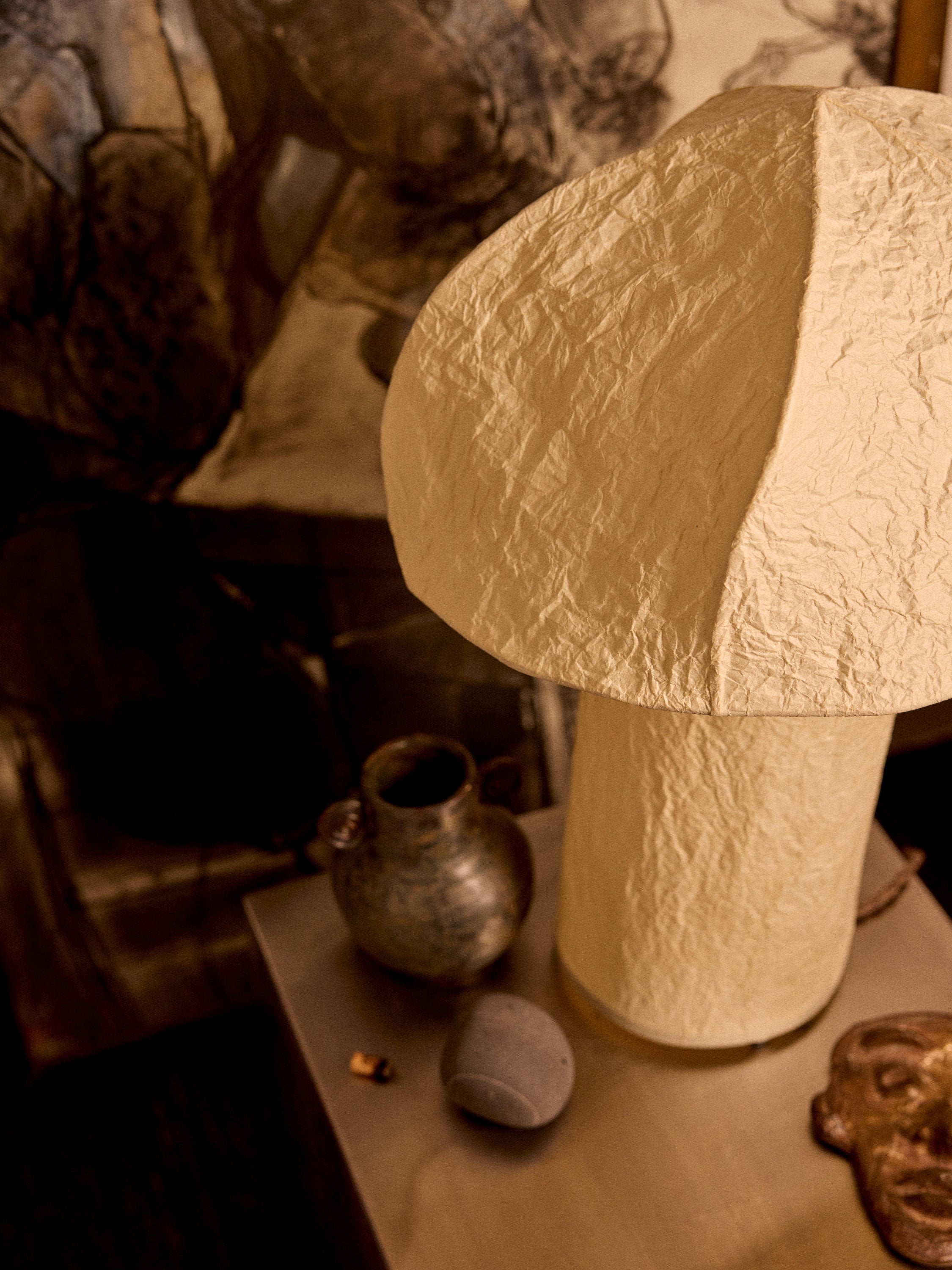Wynn' Paper Table Lamp — close-up of textured paper shade on table